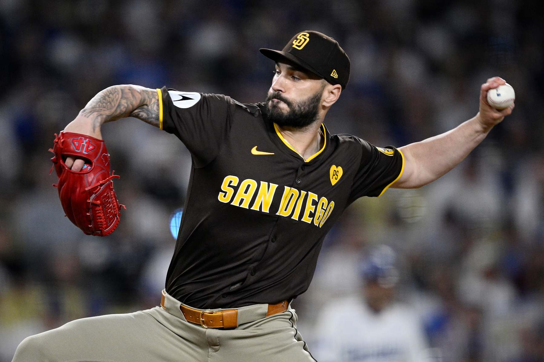 LOS ANGELES, CALIFORNIA - OCTOBER 06: Tanner Scott #66 of the San Diego Padres pitches in the eighth inning against the Los Angeles Dodgers during Game Two of the Division Series at Dodger Stadium on October 06, 2024 in Los Angeles, California. (Photo by Orlando Ramirez/Getty Images)