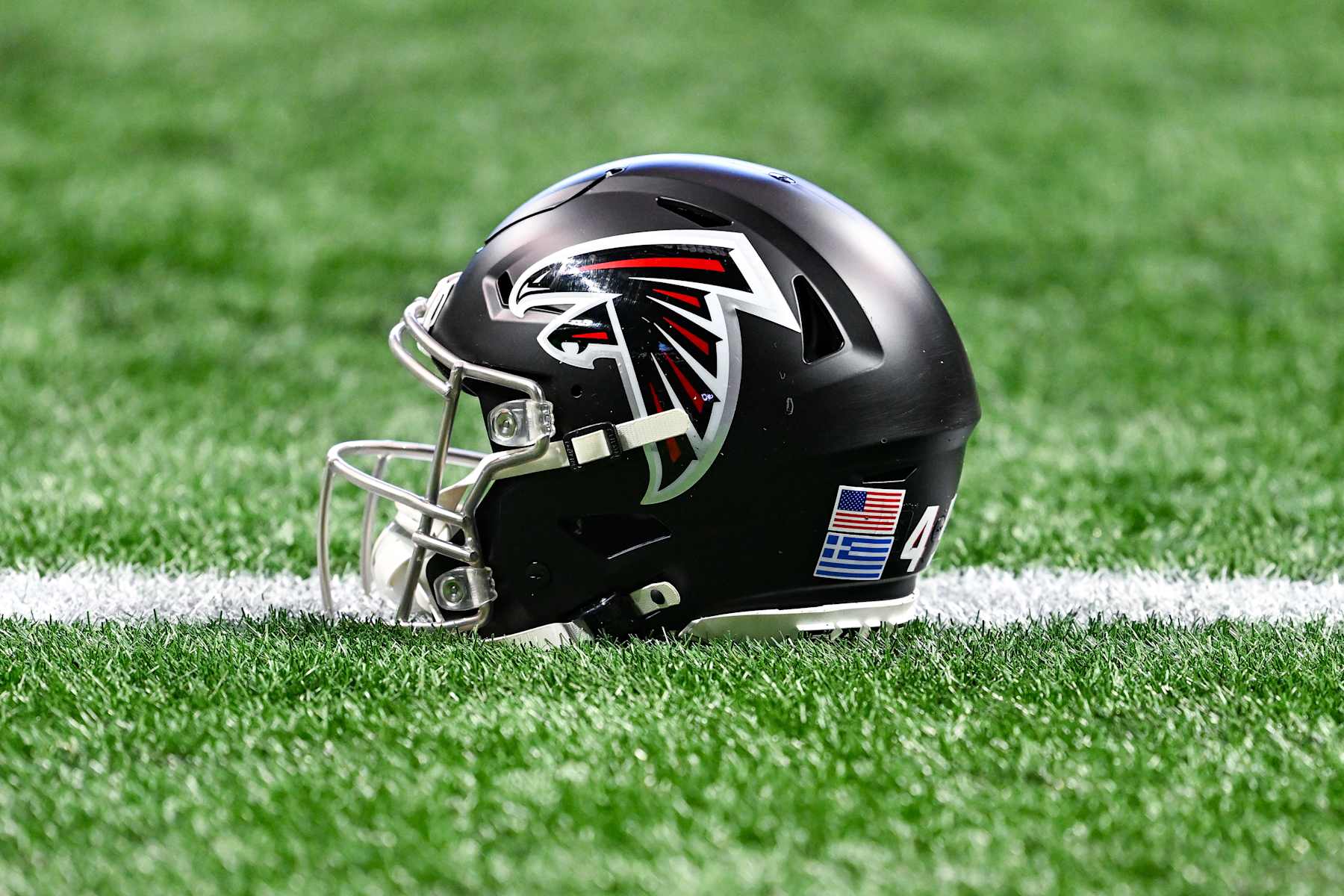 ATLANTA, GA  JANUARY 05:  An Atlanta football helmet on the turf prior to the start of the NFL game between the Carolina Panthers and the Atlanta Falcons on January 5th, 2025 at Mercedes-Benz Stadium in Atlanta, GA.  (Photo by Rich von Biberstein/Icon Sportswire via Getty Images)