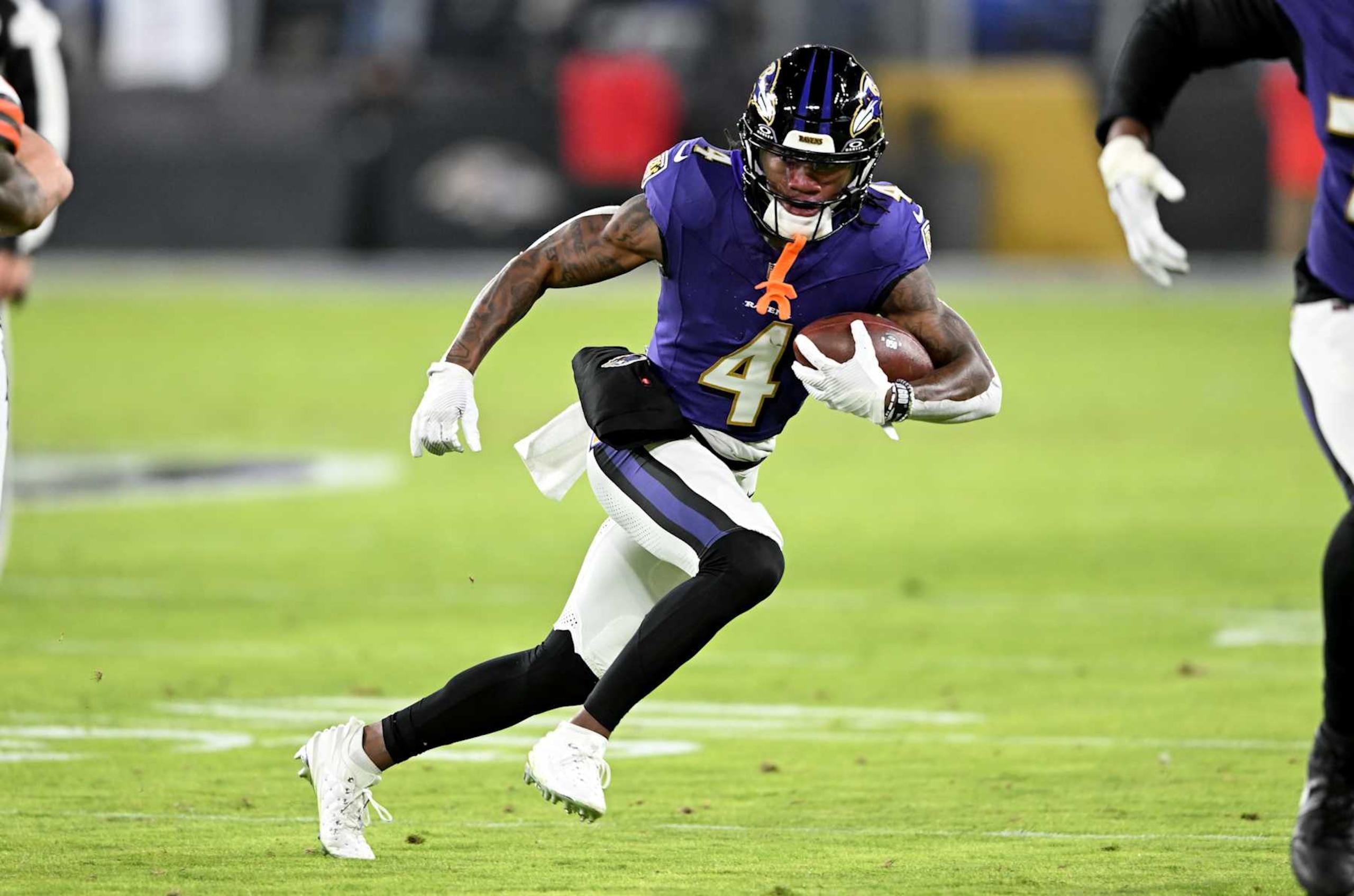 BALTIMORE, MARYLAND - JANUARY 04: Zay Flowers #4 of the Baltimore Ravens runs with the ball after making a catch against the Cleveland Browns at M&T Bank Stadium on January 04, 2025 in Baltimore, Maryland. (Photo by G Fiume/Getty Images) BALTIMORE, MARYLAND - JANUARY 04: Zay Flowers #4 of the Baltimore Ravens runs with the ball after making a catch against the Cleveland Browns at M&T Bank Stadium on January 04, 2025 in Baltimore, Maryland. (Photo by G Fiume/Getty Images)