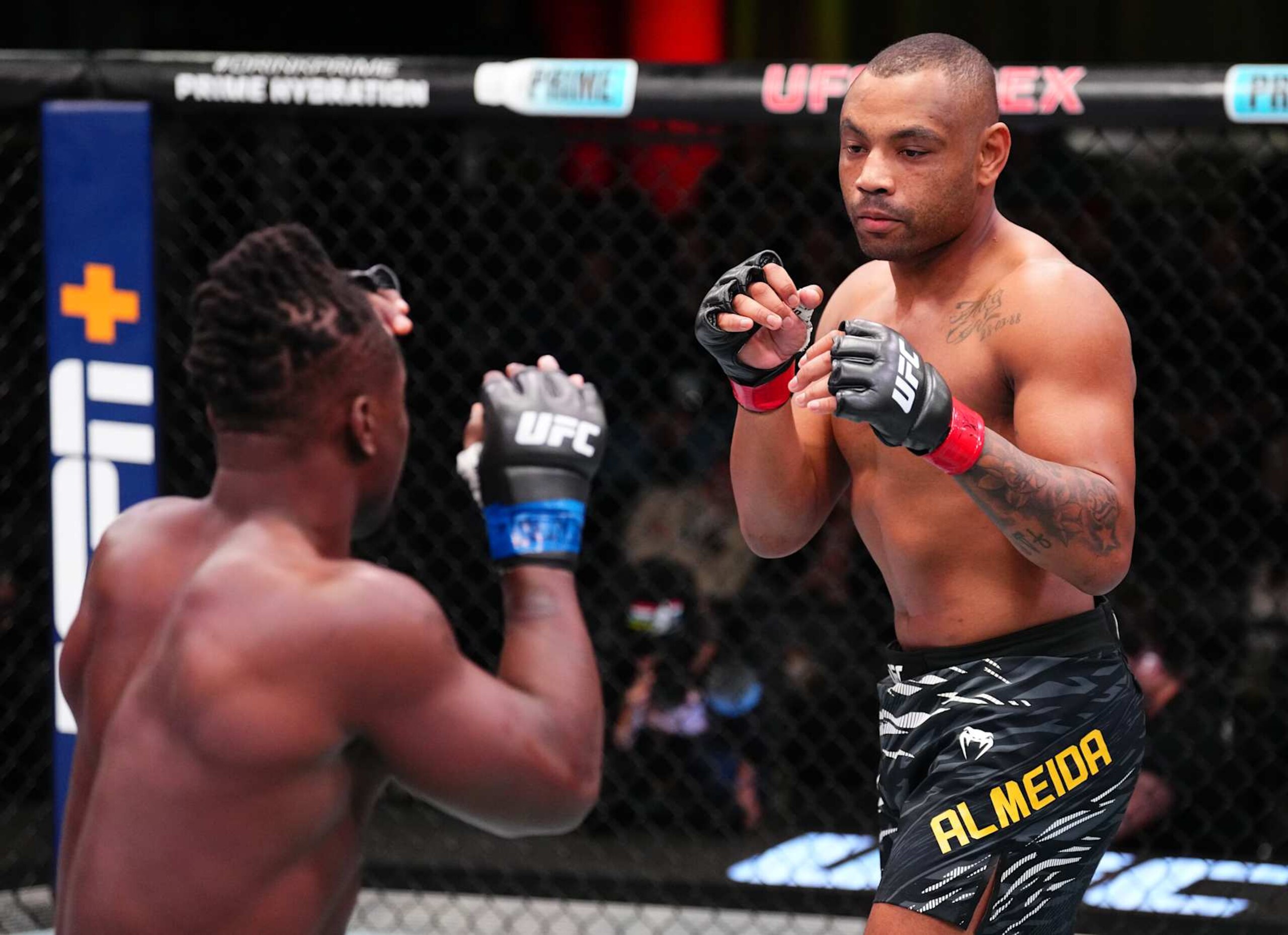 LAS VEGAS, NEVADA - JANUARY 11: (R-L) Cesar Almeida of Brazil battles Abdul Razak Alhassan of Ghana in a middleweight fight during the UFC Fight Night event at UFC APEX on January 11, 2025 in Las Vegas, Nevada. (Photo by Chris Unger/Zuffa LLC via Getty Images) LAS VEGAS, NEVADA - JANUARY 11: (R-L) Cesar Almeida of Brazil battles Abdul Razak Alhassan of Ghana in a middleweight fight during the UFC Fight Night event at UFC APEX on January 11, 2025 in Las Vegas, Nevada. (Photo by Chris Unger/Zuffa LLC via Getty Images)