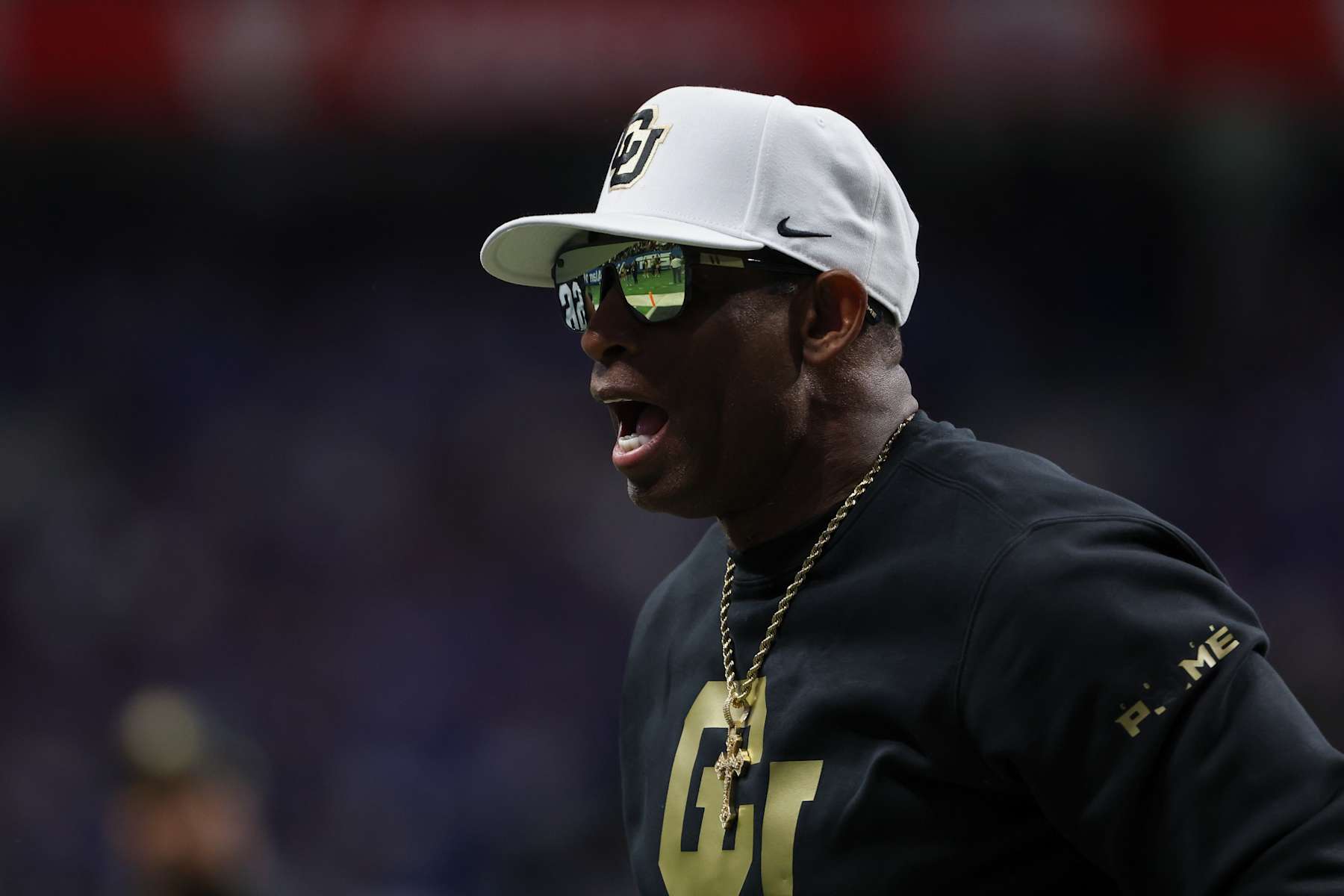 SAN ANTONIO, TX - DECEMBER 28: Colorado Buffaloes head coach Deion Sanders on the field before the football game between BYU Cougars and Colorado Buffalos on December 28, 2024, at the Alamodome in San Antonio, Texas. (Photo by David Buono/Icon Sportswire via Getty Images)