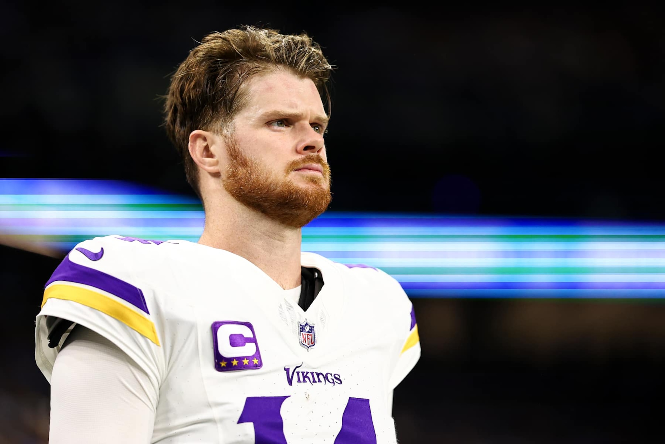 DETROIT, MICHIGAN - JANUARY 5: Sam Darnold #14 of the Minnesota Vikings stands on the sidelines during the national anthem prior to an NFL football game against the Detroit Lions at Ford Field on January 5, 2025 in Detroit, Michigan. (Photo by Kevin Sabitus/Getty Images)