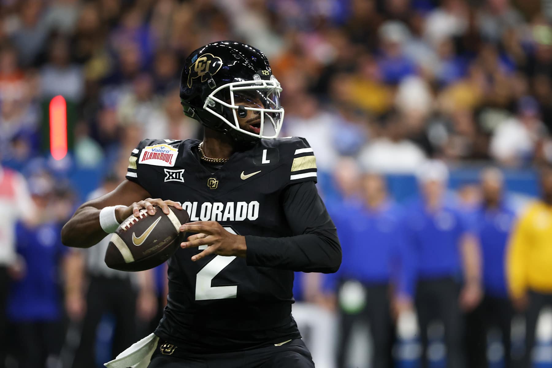 SAN ANTONIO, TX - DECEMBER 28: Colorado Buffaloes quarterback Shedeur Sanders (2) readies to pass the ball during the football game between BYU Cougars and Colorado Buffalos on December 28, 2024, at the Alamodome in San Antonio, Texas. (Photo by David Buono/Icon Sportswire via Getty Images)