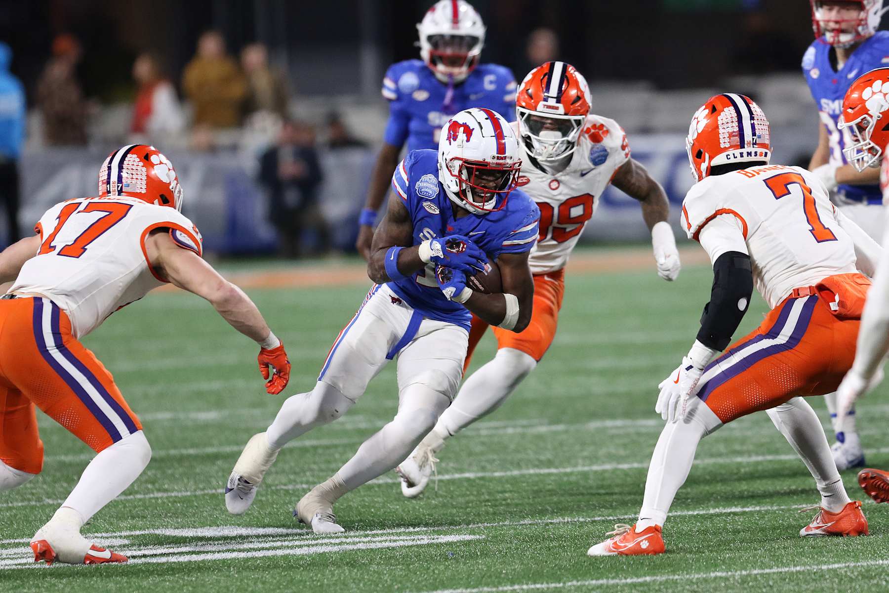 SMU's Brashard Smith surrounded by several Clemson defenders