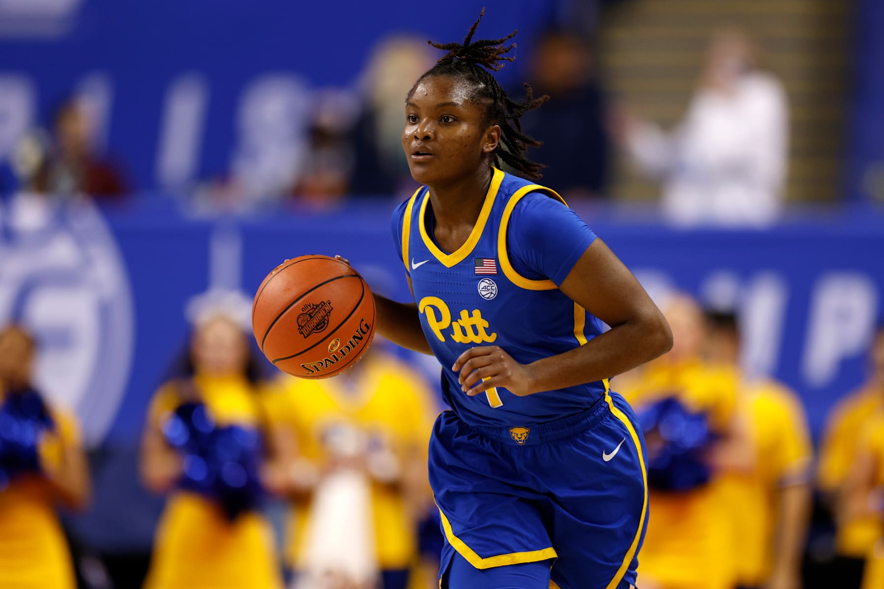 GREENSBORO, NORTH CAROLINA - MARCH 6: Aaryn Battle #1 of the Pittsburgh Panthers dribbles up court during the first half of the game against the Georgia Tech Yellow Jackets in the First Round of the ACC Women's Basketball Tournament at Greensboro Coliseum on March 6, 2024 in Greensboro, North Carolina. (Photo by Lance King/Getty Images)