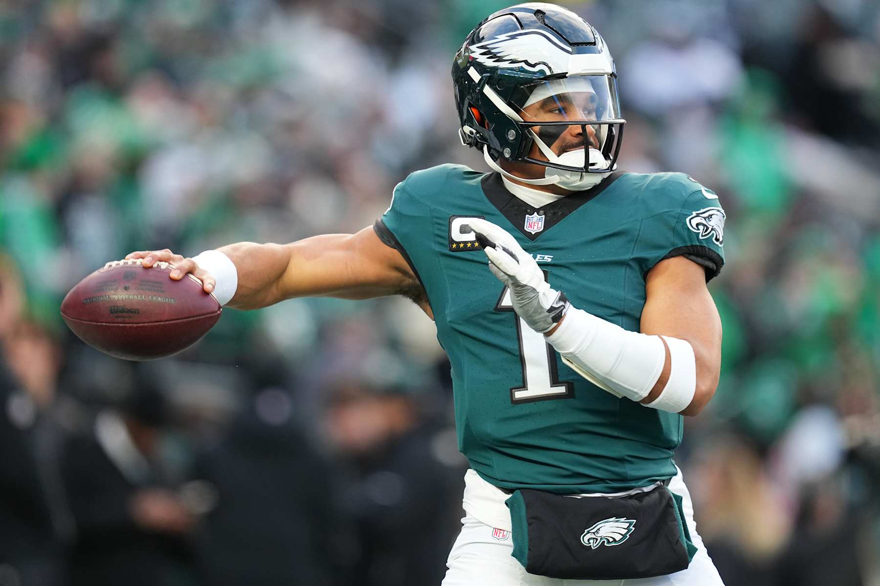 PHILADELPHIA, PENNSYLVANIA - JANUARY 12: Quarterback Jalen Hurts #1 of the Philadelphia Eagles warms up prior to a game against the Green Bay Packers during the NFC Wild Card Playoff at Lincoln Financial Field on January 12, 2025 in Philadelphia, Pennsylvania.  (Photo by Mitchell Leff/Getty Images)