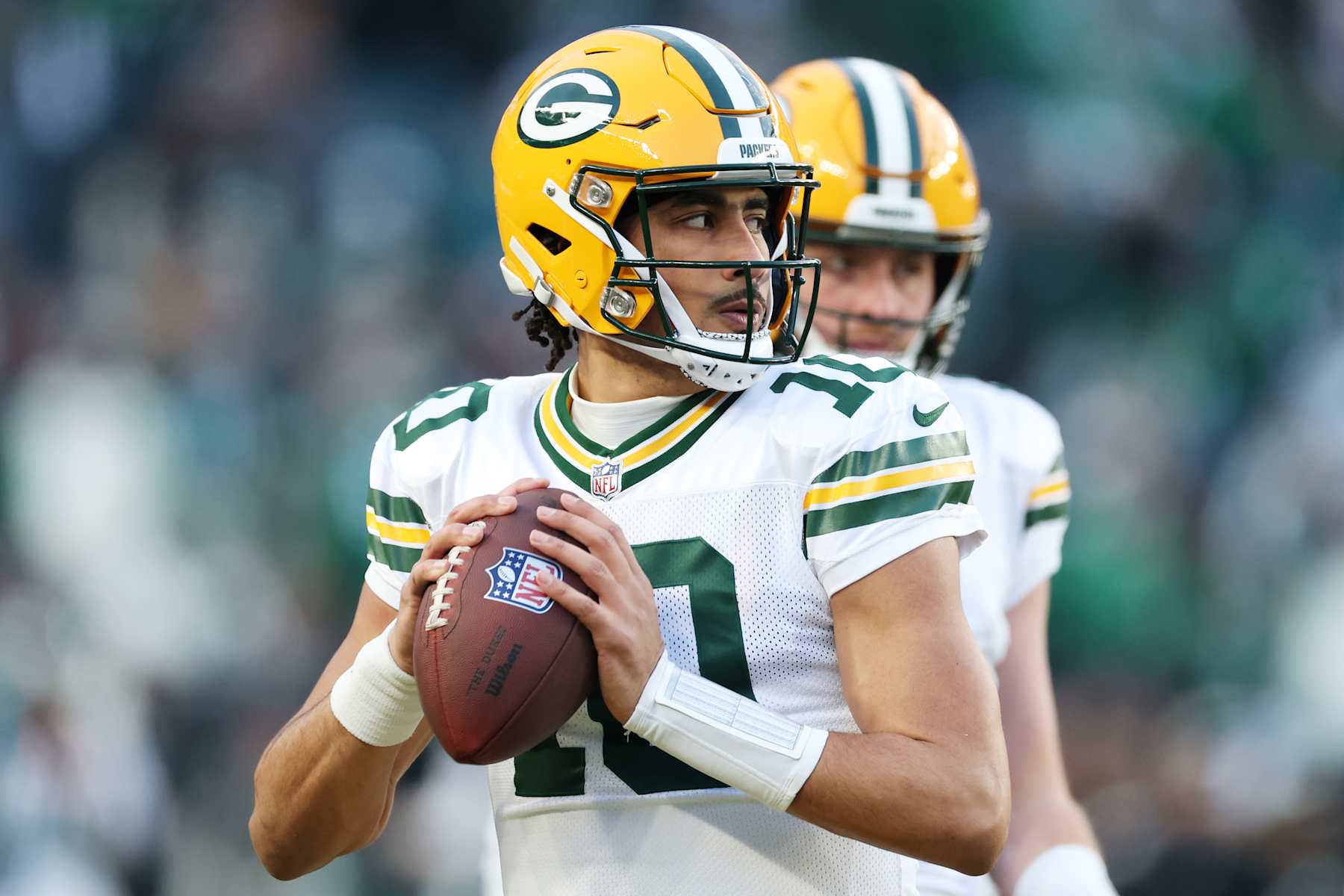 PHILADELPHIA, PENNSYLVANIA - JANUARY 12: Quarterback Jordan Love #10 of the Green Bay Packers warms up prior to a game against the Philadelphia Eagles during the NFC Wild Card Playoff at Lincoln Financial Field on January 12, 2025 in Philadelphia, Pennsylvania.  (Photo by Al Bello/Getty Images)