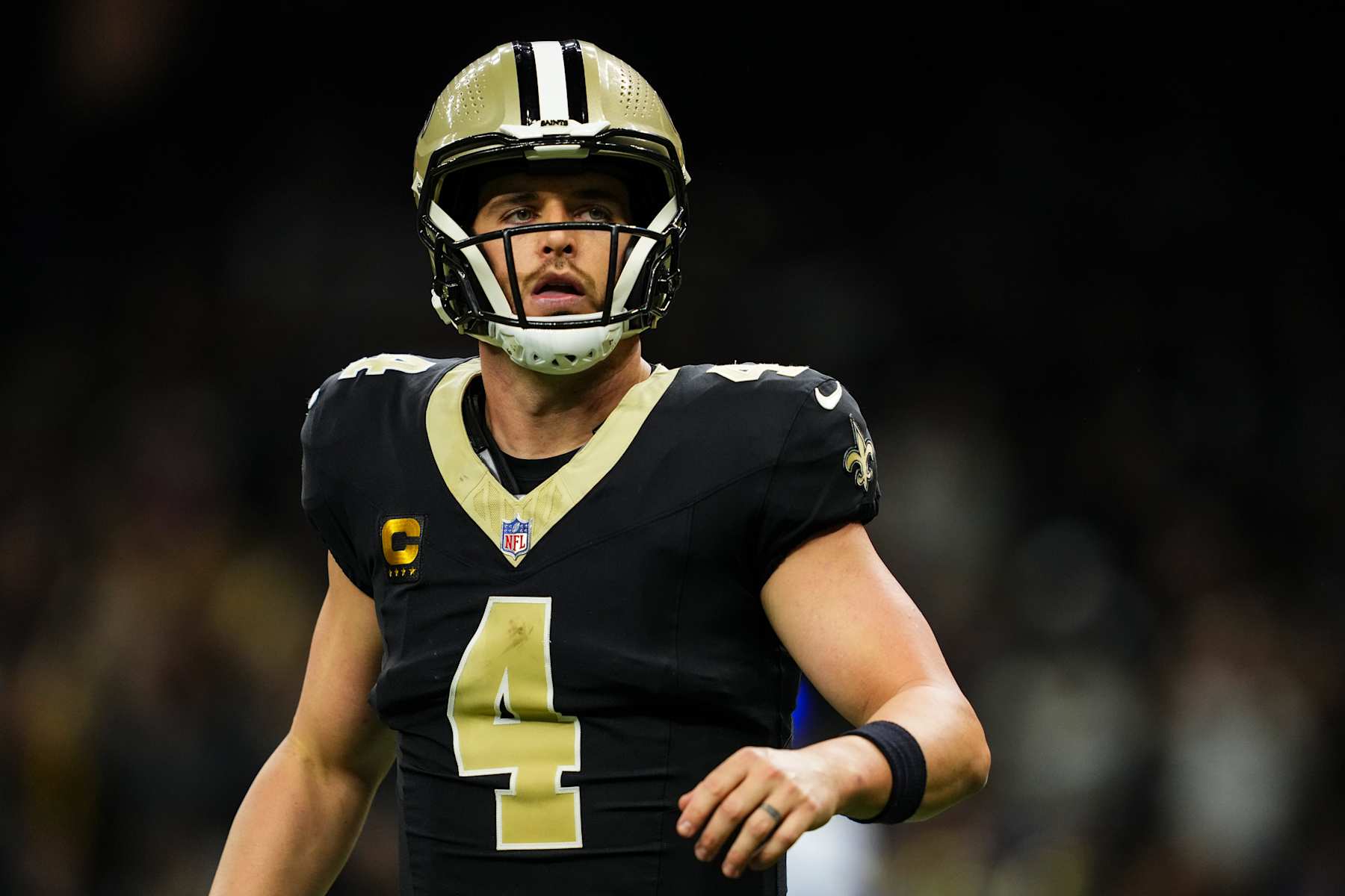 NEW ORLEANS, LA - DECEMBER 01: Derek Carr #4 of the New Orleans Saints looks on from the field during an NFL football game against the Los Angeles Rams at Caesars Superdome on December 1, 2024 in New Orleans, Louisiana. (Photo by Cooper Neill/Getty Images)