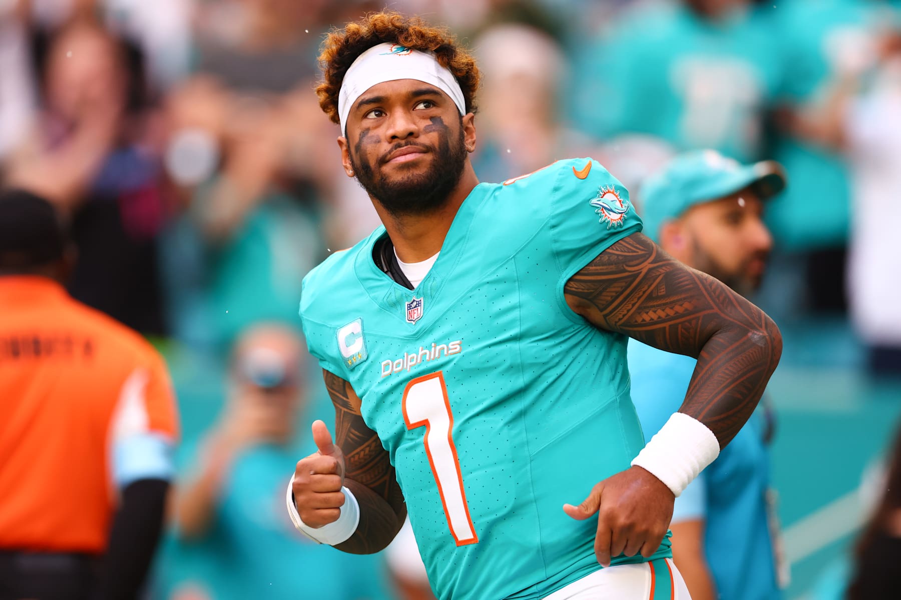 MIAMI GARDENS, FLORIDA - DECEMBER 22: Tua Tagovailoa #1 of the Miami Dolphins takes the field prior to a game against the San Francisco 49ers at Hard Rock Stadium on December 22, 2024 in Miami Gardens, Florida. (Photo by Megan Briggs/Getty Images)