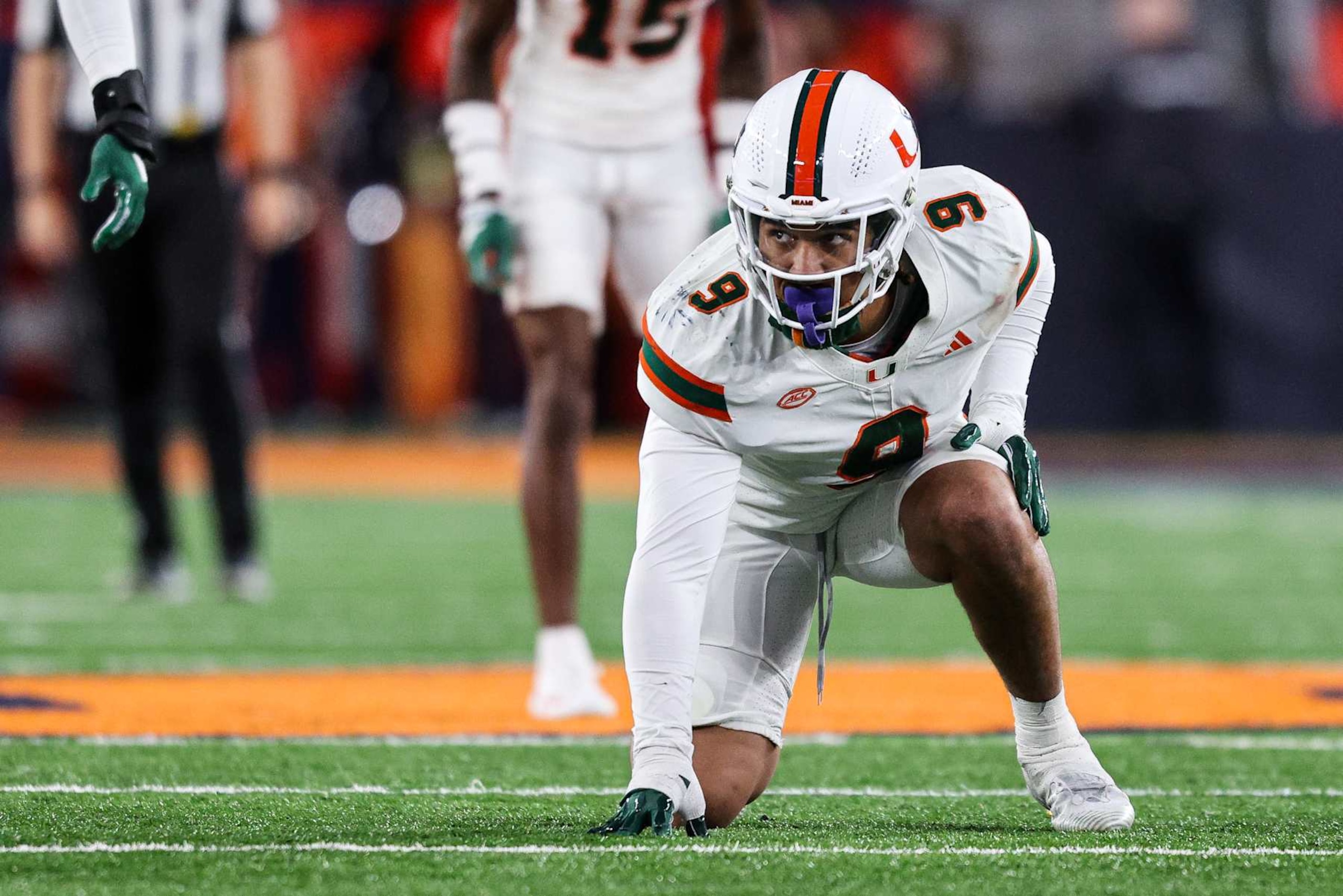 SYRACUSE, NEW YORK - NOVEMBER 30: Tyler Baron #9 of the Miami Hurricanes lines up during the second quarter against the Syracuse Orange at JMA Wireless Dome on November 30, 2024 in Syracuse, New York. (Photo by Bryan Bennett/Getty Images) SYRACUSE, NEW YORK - NOVEMBER 30: Tyler Baron #9 of the Miami Hurricanes lines up during the second quarter against the Syracuse Orange at JMA Wireless Dome on November 30, 2024 in Syracuse, New York. (Photo by Bryan Bennett/Getty Images)