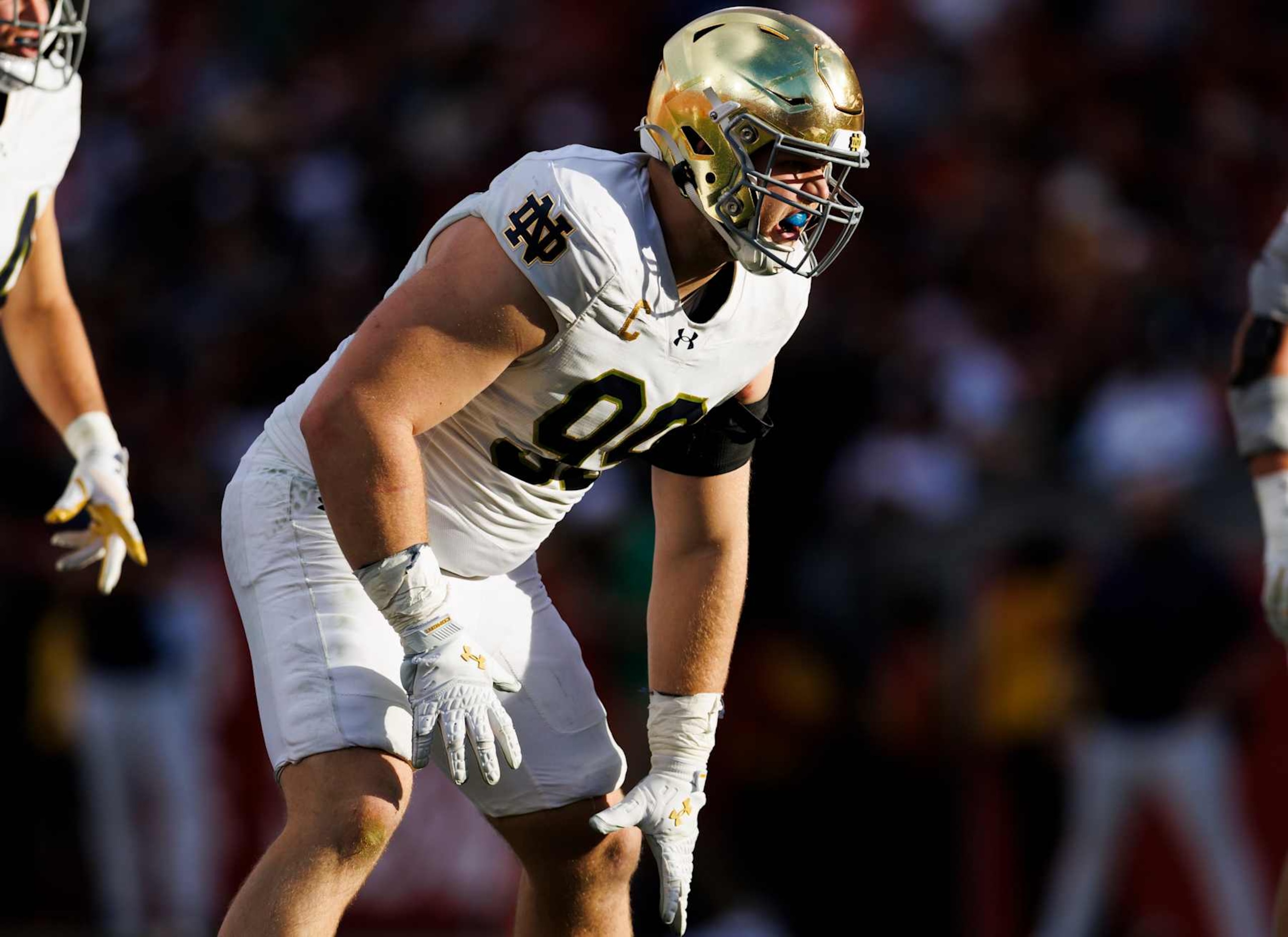 LOS ANGELES, CALIFORNIA - NOVEMBER 30: Rylie Mills #99 of the Notre Dame Fighting Irish in a defensive stance during the second half against USC Trojans at United Airlines Field at the Los Angeles Memorial Coliseum on November 30, 2024 in Los Angeles, California. (Photo by Ric Tapia/Getty Images)