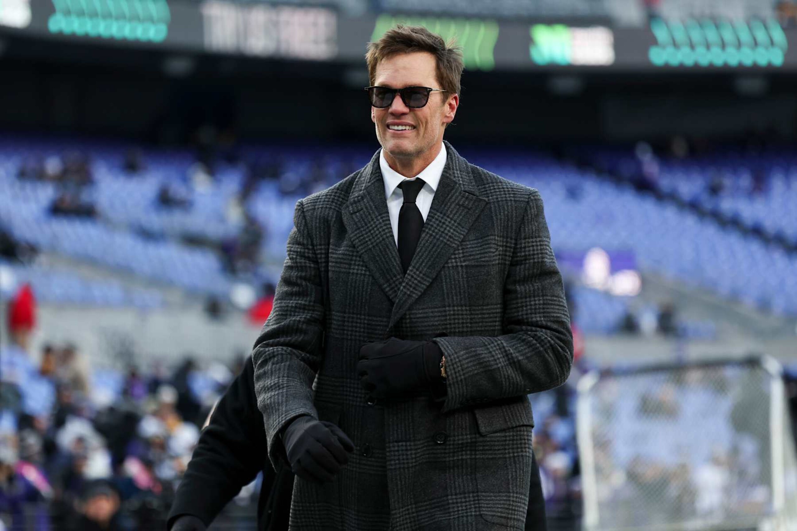 BALTIMORE, MARYLAND - DECEMBER 21: Former NFL quarterback Tom Brady is seen on the field prior to a game between the Pittsburgh Steelers and the Baltimore Ravens at M&T Bank Stadium on December 21, 2024 in Baltimore, Maryland. The Ravens defeated the Steelers 34-17. (Kara Durrette/Getty Images) BALTIMORE, MARYLAND - DECEMBER 21: Former NFL quarterback Tom Brady is seen on the field prior to a game between the Pittsburgh Steelers and the Baltimore Ravens at M&T Bank Stadium on December 21, 2024 in Baltimore, Maryland. The Ravens defeated the Steelers 34-17. (Kara Durrette/Getty Images)