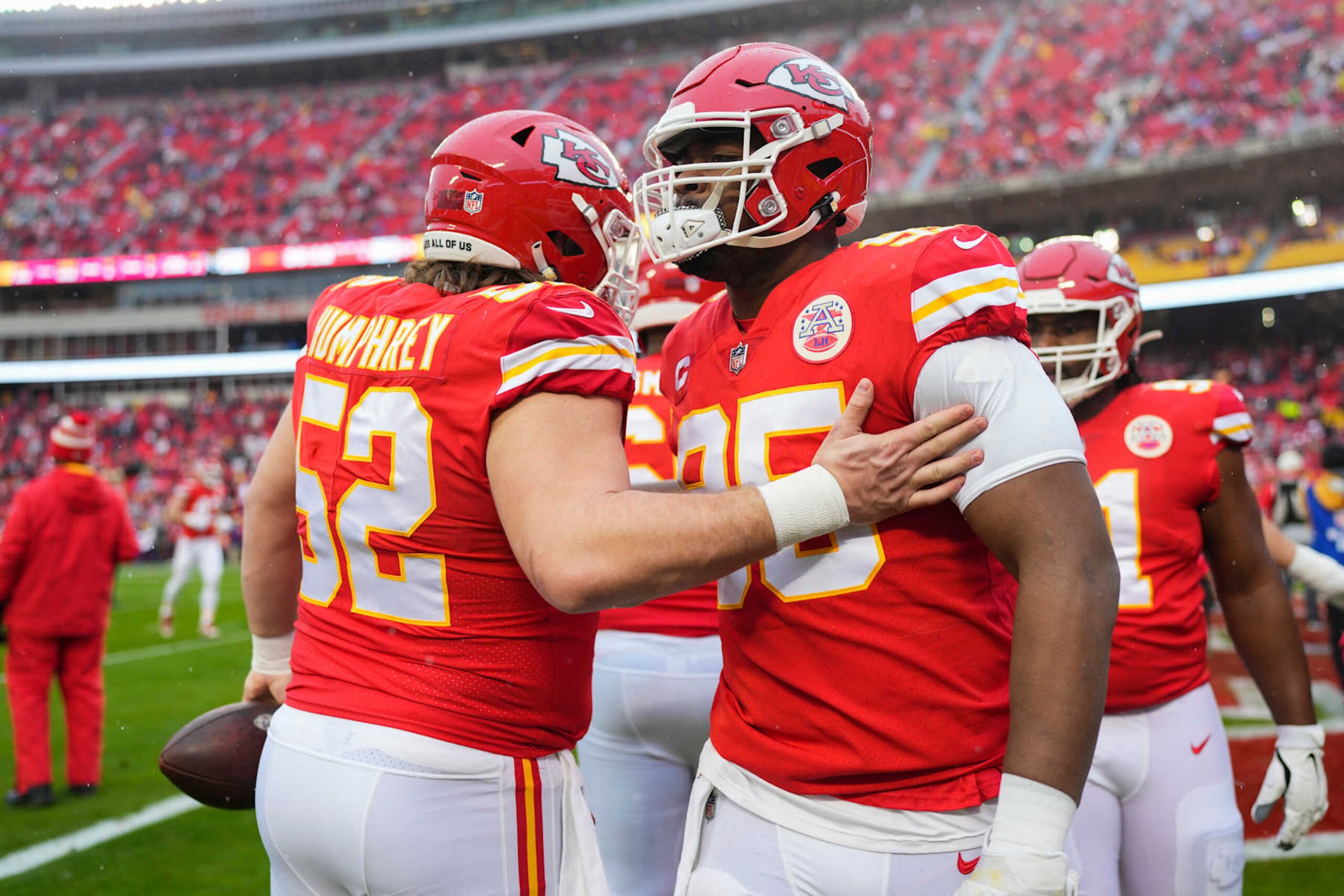 KANSAS CITY, MO - JANUARY 21: Creed Humphrey #52 of the Kansas City Chiefs speaks with Chris Jones #95 against the Jacksonville Jaguars at GEHA Field at Arrowhead Stadium on January 21, 2023 in Kansas City, Missouri. (Photo by Cooper Neill/Getty Images)