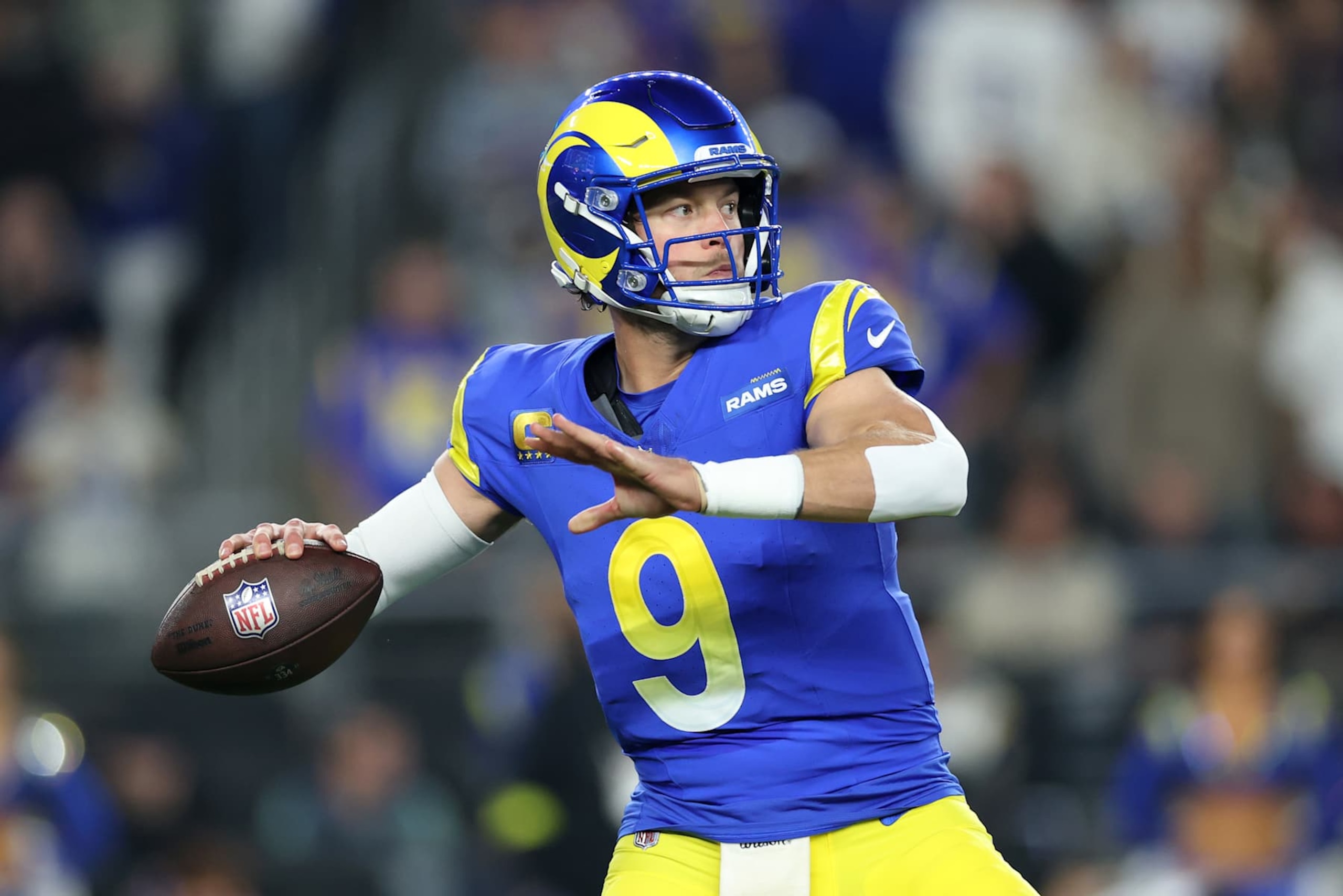 GLENDALE, ARIZONA - JANUARY 13: Matthew Stafford #9 of the Los Angeles Rams throws a pass during the first quarter against the Minnesota Vikings during the NFC Wild Card Playoff at State Farm Stadium on January 13, 2025 in Glendale, Arizona. (Photo by Christian Petersen/Getty Images) GLENDALE, ARIZONA - JANUARY 13: Matthew Stafford #9 of the Los Angeles Rams throws a pass during the first quarter against the Minnesota Vikings during the NFC Wild Card Playoff at State Farm Stadium on January 13, 2025 in Glendale, Arizona. (Photo by Christian Petersen/Getty Images)
