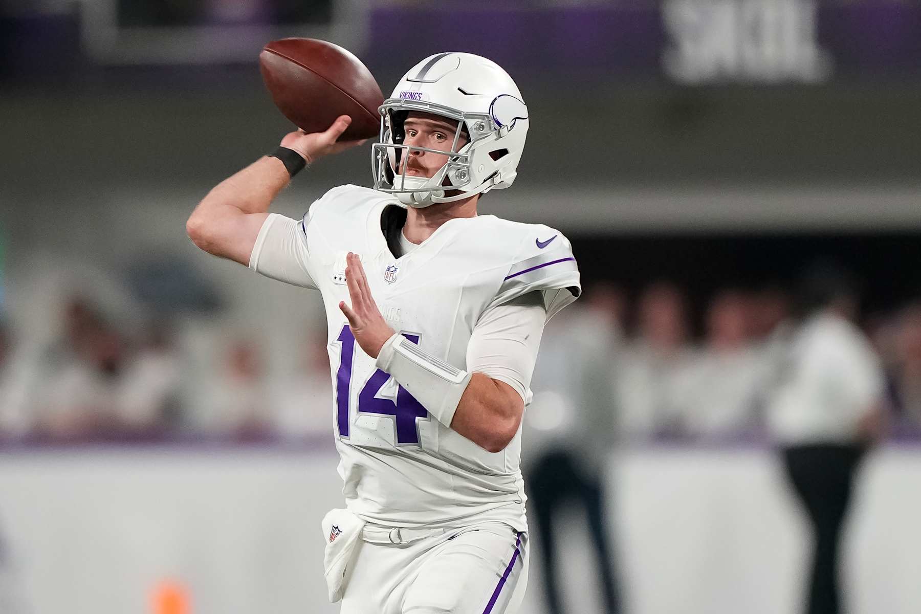 MINNEAPOLIS, MINNESOTA - DECEMBER 16: Quarterback Sam Darnold #14 of the Minnesota Vikings throws a pass during the third quarter of an NFL football game against the Chicago Bears, at U.S. Bank Stadium on December 16, 2024 in Minneapolis, Minnesota. (Photo by Todd Rosenberg/Getty Images)