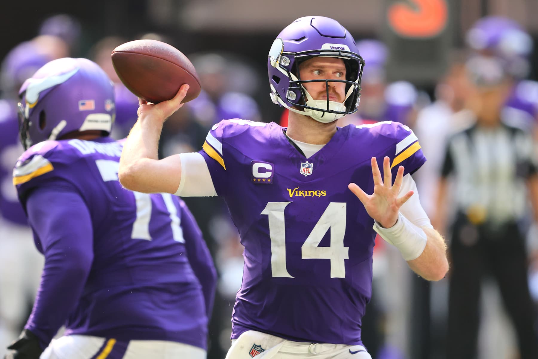 MINNEAPOLIS, MINNESOTA - SEPTEMBER 15: Sam Darnold #14 of the Minnesota Vikings throws a pass against the San Francisco 49ers during the fourth quarter at U.S. Bank Stadium on September 15, 2024 in Minneapolis, Minnesota. (Photo by Adam Bettcher/Getty Images)
