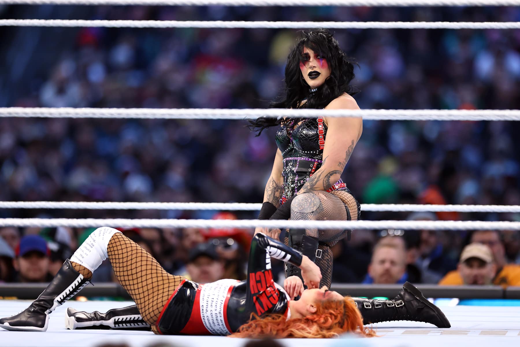 PHILADELPHIA, PENNSYLVANIA - APRIL 06: Rhea Ripley reacts during a match against Becky Lynch for the WWE Women's World Championship during Night One of WrestleMania 40 at Lincoln Financial Field on April 06, 2024 in Philadelphia, Pennsylvania.  (Photo by Tim Nwachukwu/Getty Images)