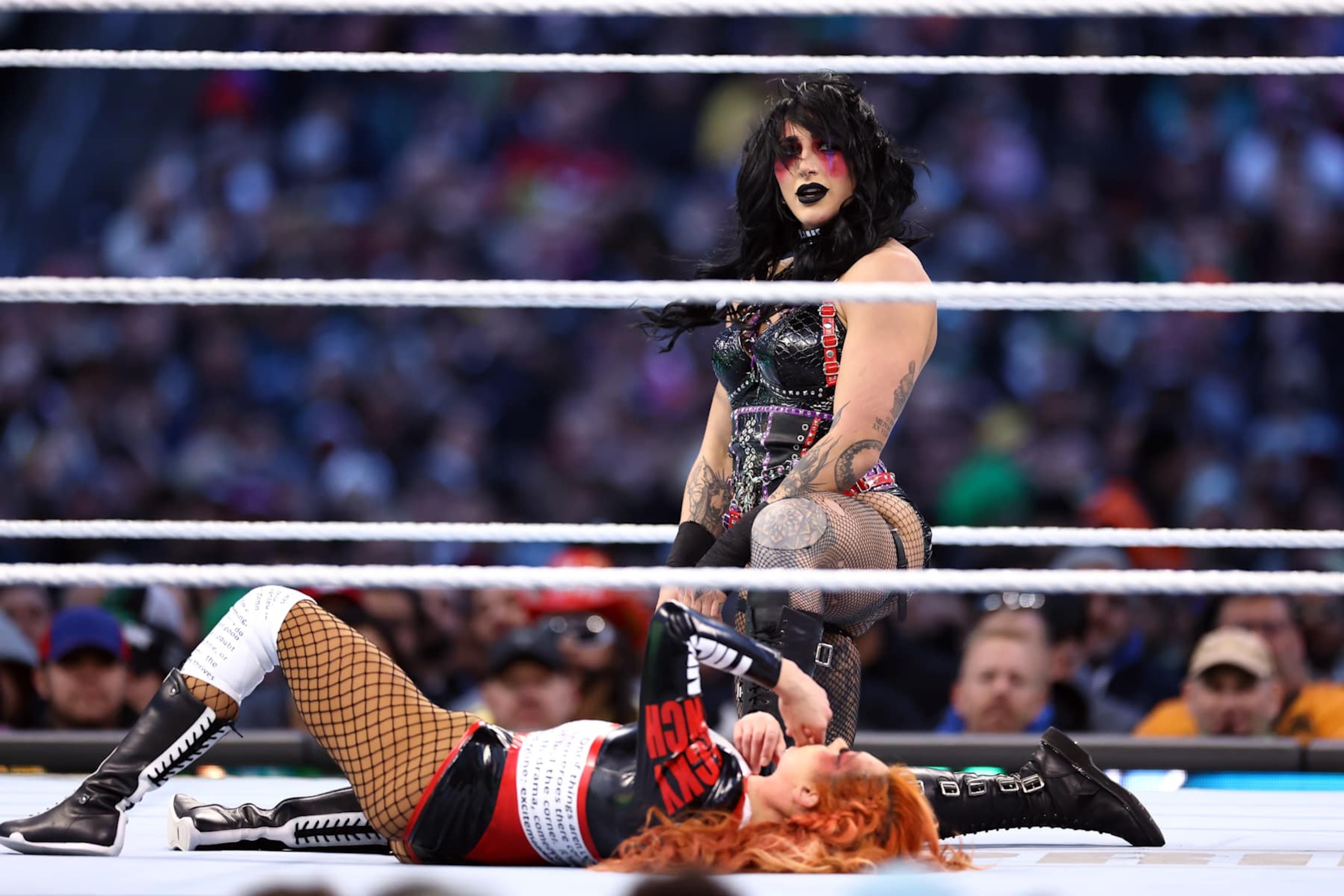 PHILADELPHIA, PENNSYLVANIA - APRIL 06: Rhea Ripley reacts during a match against Becky Lynch for the WWE Women's World Championship during Night One of WrestleMania 40 at Lincoln Financial Field on April 06, 2024 in Philadelphia, Pennsylvania.  (Photo by Tim Nwachukwu/Getty Images)