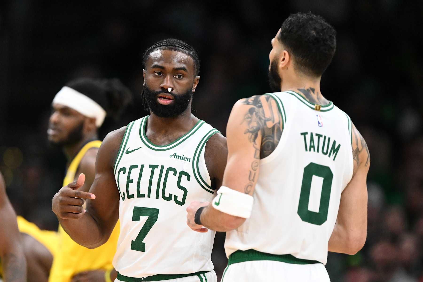 BOSTON, MASSACHUSETTS - DECEMBER 29: Jaylen Brown #7 and Jayson Tatum #0 of the Boston Celtics talk during the fourth quarter against the Indiana Pacers at the TD Garden on December 29, 2024 in Boston, Massachusetts. NOTE TO USER: User expressly acknowledges and agrees that, by downloading and or using this photograph, User is consenting to the terms and conditions of the Getty Images License Agreement. (Photo by Brian Fluharty/Getty Images)