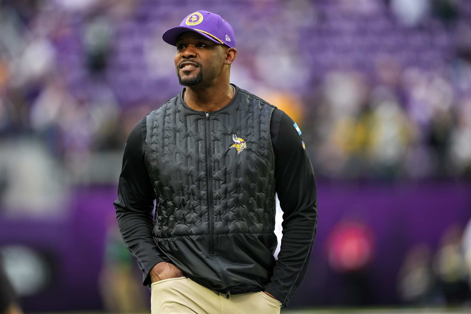 MINNEAPOLIS, MINNESOTA - DECEMBER 29: Defensive coordinator Brian Flores of the Minnesota Vikings looks on prior to a game between the Minnesota Vikings and Green Bay Packers at U.S. Bank Stadium on December 29, 2024 in Minneapolis, Minnesota. (Photo by Brace Hemmelgarn/Getty Images)