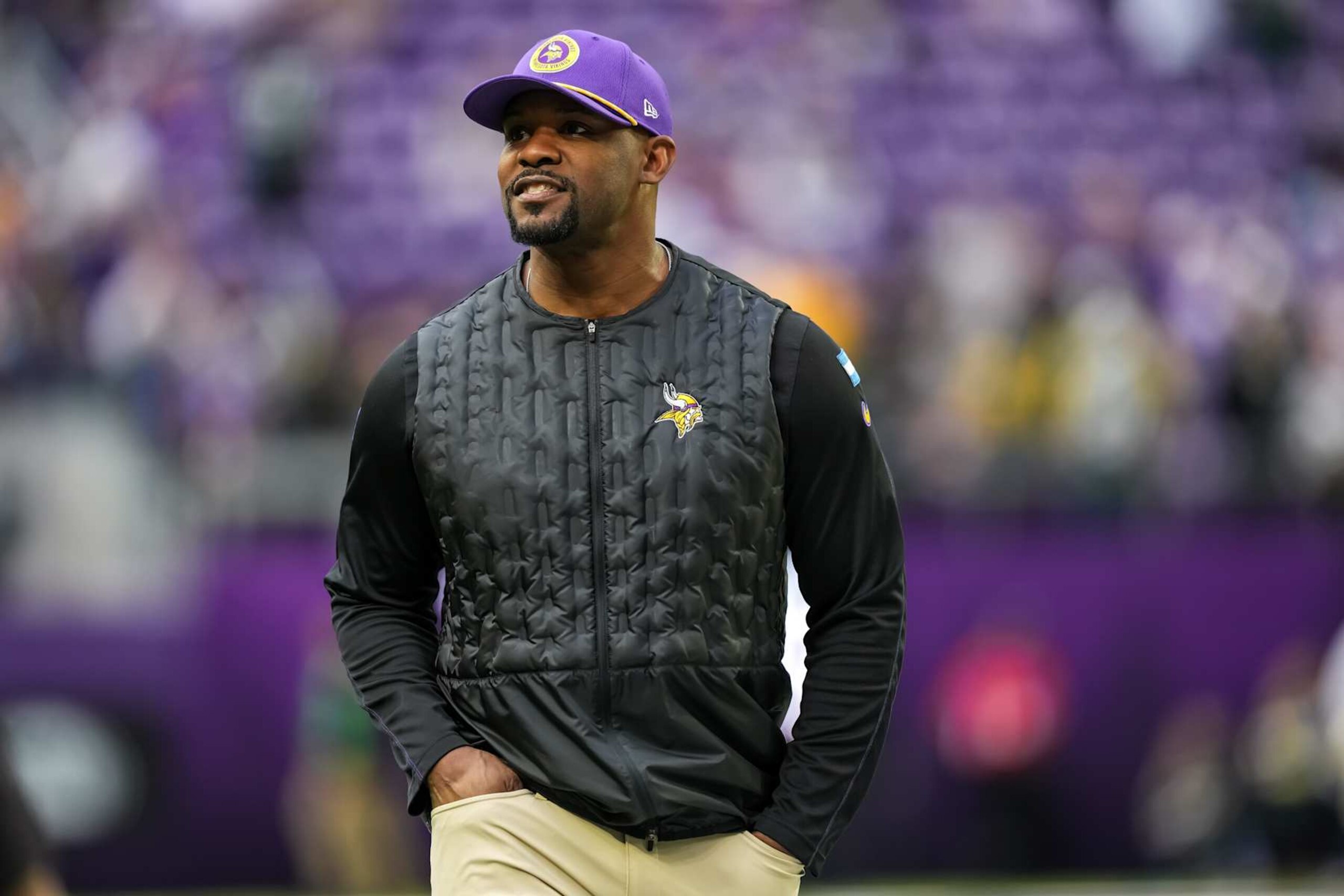 MINNEAPOLIS, MINNESOTA - DECEMBER 29: Defensive coordinator Brian Flores of the Minnesota Vikings looks on prior to a game between the Minnesota Vikings and Green Bay Packers at U.S. Bank Stadium on December 29, 2024 in Minneapolis, Minnesota. (Photo by Brace Hemmelgarn/Getty Images)