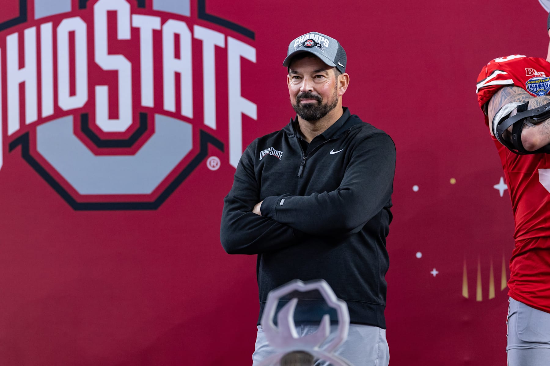 ARLINGTON, TX - JANUARY 10: Ohio State Buckeyes head coach Ryan Day looks on from the stage after the CFP Semifinal Cotton Bowl Classic football game between the Ohio State Buckeyes and Texas Longhorns on January 10, 2025 at AT&T Stadium in Arlington, TX.  (Photo by Matthew Visinsky/Icon Sportswire via Getty Images)