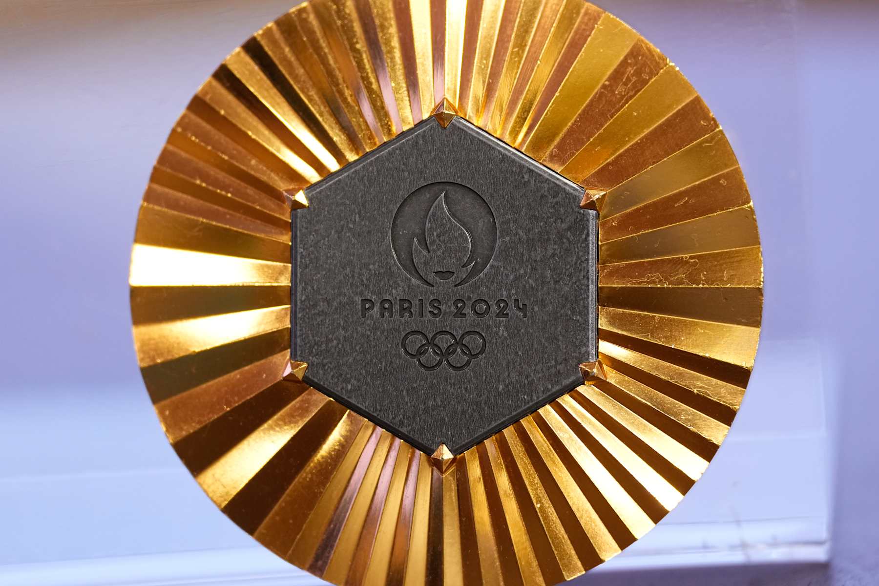 MADRID, SPAIN - DECEMBER 09: Detail of the Pairs 2024 Olympics Games gold medal won by Maria Perez during the Desayunos Deportivos Europa Press - Maria Perez celebrated at Meeting Place Castellana 81 on December 09, 2024, in Madrid, Spain. (Photo By Oscar J. Barroso/Europa Press via Getty Images)