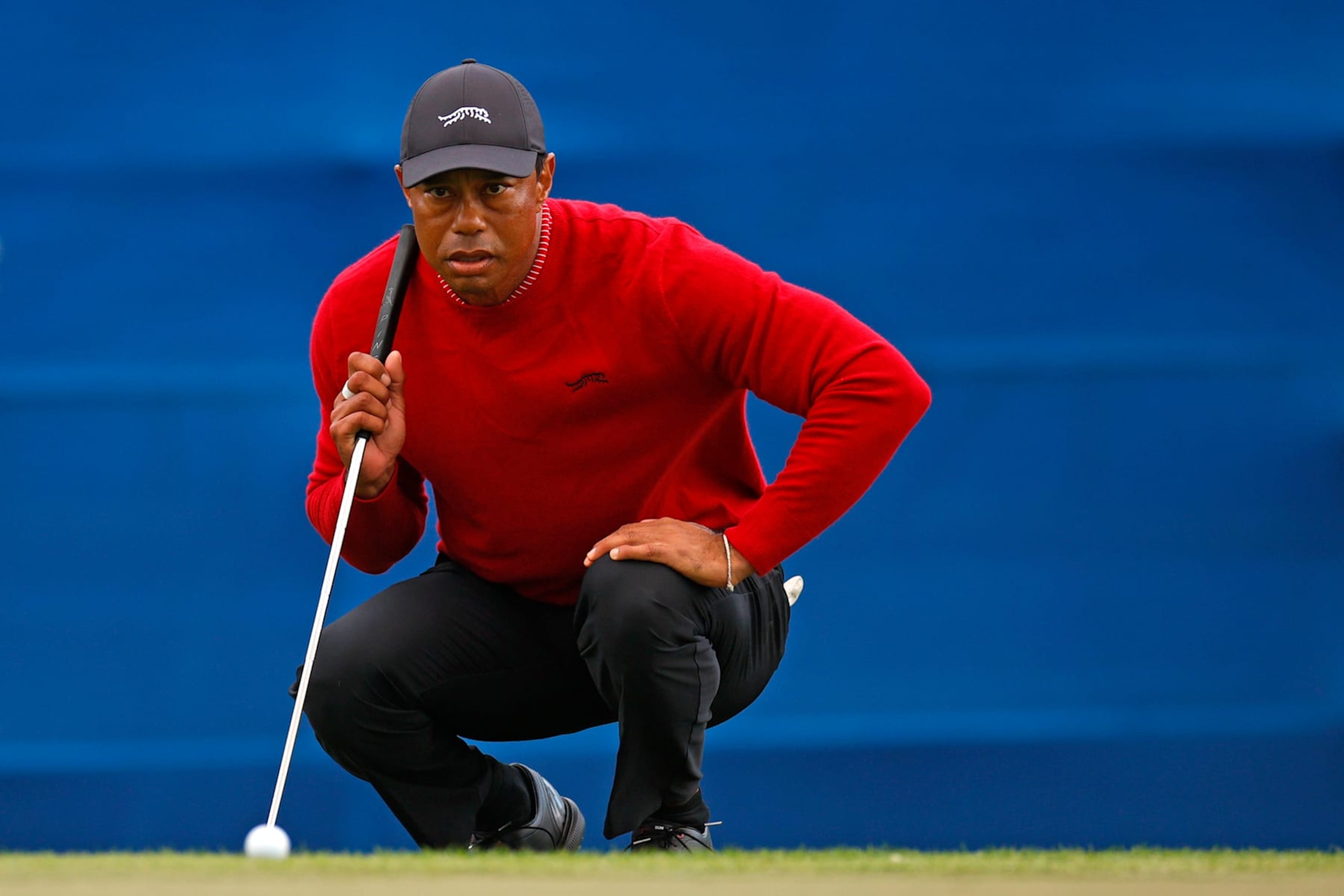 ORLANDO, FLORIDA - DECEMBER 22: Tiger Woods of the United States lines up a putt on the 18th green during a sudden-death playoff during the second round of the PNC Championship at Ritz-Carlton Golf Club on December 22, 2024 in Orlando, Florida. (Photo by Mike Ehrmann/Getty Images) ORLANDO, FLORIDA - DECEMBER 22: Tiger Woods of the United States lines up a putt on the 18th green during a sudden-death playoff during the second round of the PNC Championship at Ritz-Carlton Golf Club on December 22, 2024 in Orlando, Florida. (Photo by Mike Ehrmann/Getty Images)