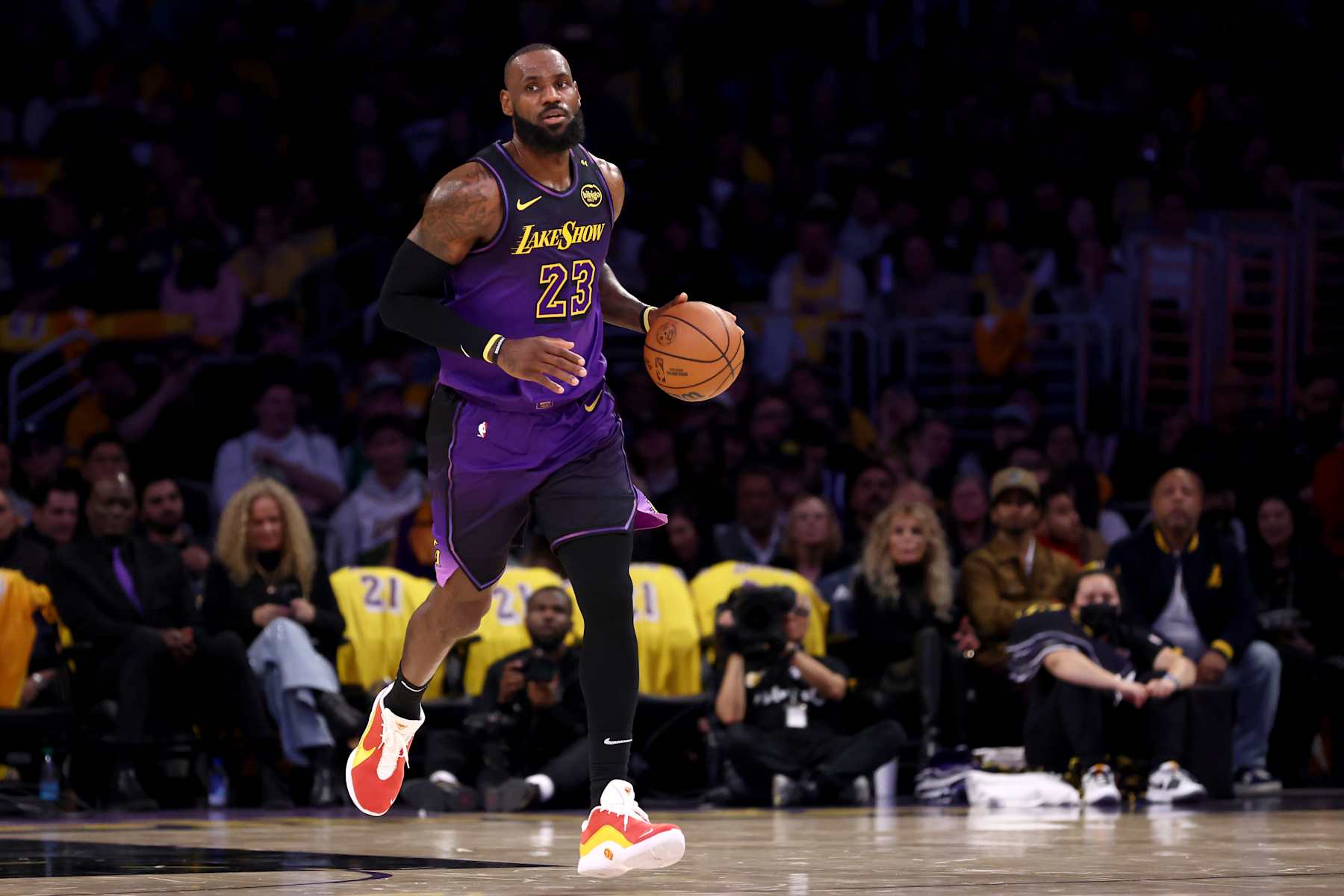 LOS ANGELES, CALIFORNIA - JANUARY 13: LeBron James #23 of the Los Angeles Lakers brings the ball up court against the San Antonio Spurs during the second quarter at Crypto.com Arena on January 13, 2025 in Los Angeles, California. NOTE TO USER: User expressly acknowledges and agrees that, by downloading and/or using this Photograph, user is consenting to the terms and conditions of the Getty Images License Agreement. (Photo by Katelyn Mulcahy/Getty Images)