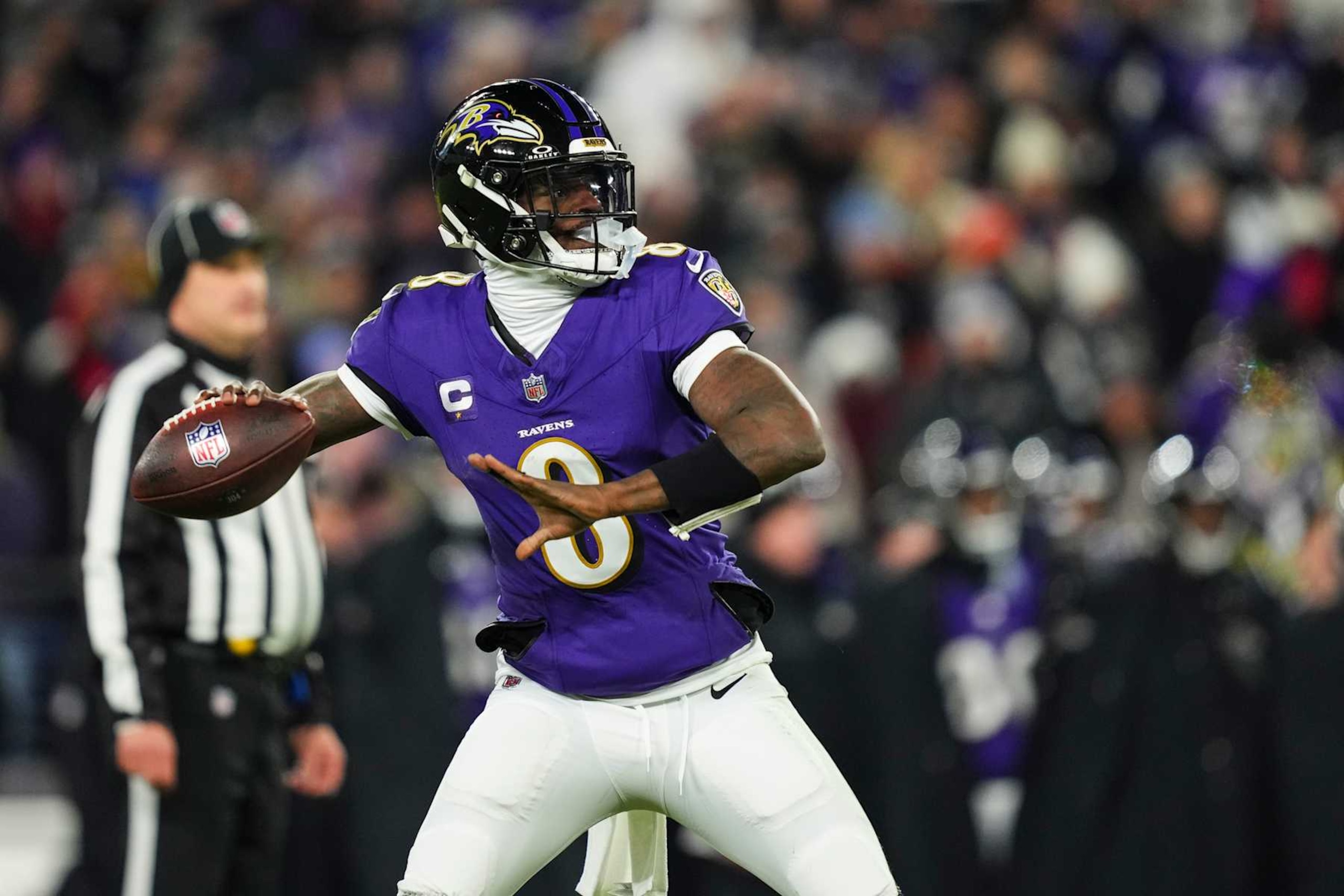 BALTIMORE, MD - JANUARY 11: Lamar Jackson #8 of the Baltimore Ravens throws the ball during an NFL football wild card playoff game against the Pittsburgh Steelers at M&T Bank Stadium on January 11, 2025 in Baltimore, Maryland. (Photo by Cooper Neill/Getty Images) BALTIMORE, MD - JANUARY 11: Lamar Jackson #8 of the Baltimore Ravens throws the ball during an NFL football wild card playoff game against the Pittsburgh Steelers at M&T Bank Stadium on January 11, 2025 in Baltimore, Maryland. (Photo by Cooper Neill/Getty Images)