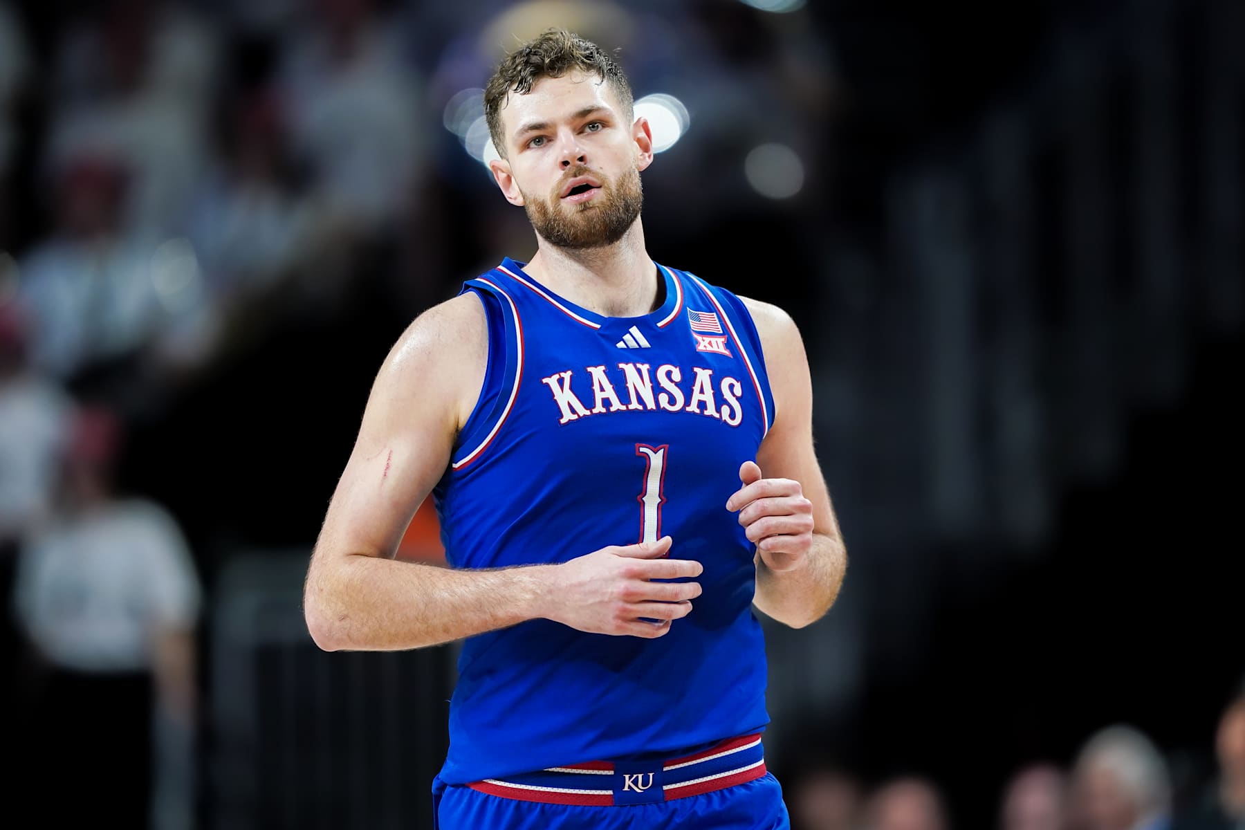 CINCINNATI, OHIO - JANUARY 11: Hunter Dickinson #1 of the Kansas Jayhawks jogs across the court in the second half against the Cincinnati Bearcats at Fifth Third Arena on January 11, 2025 in Cincinnati, Ohio. (Photo by Dylan Buell/Getty Images)