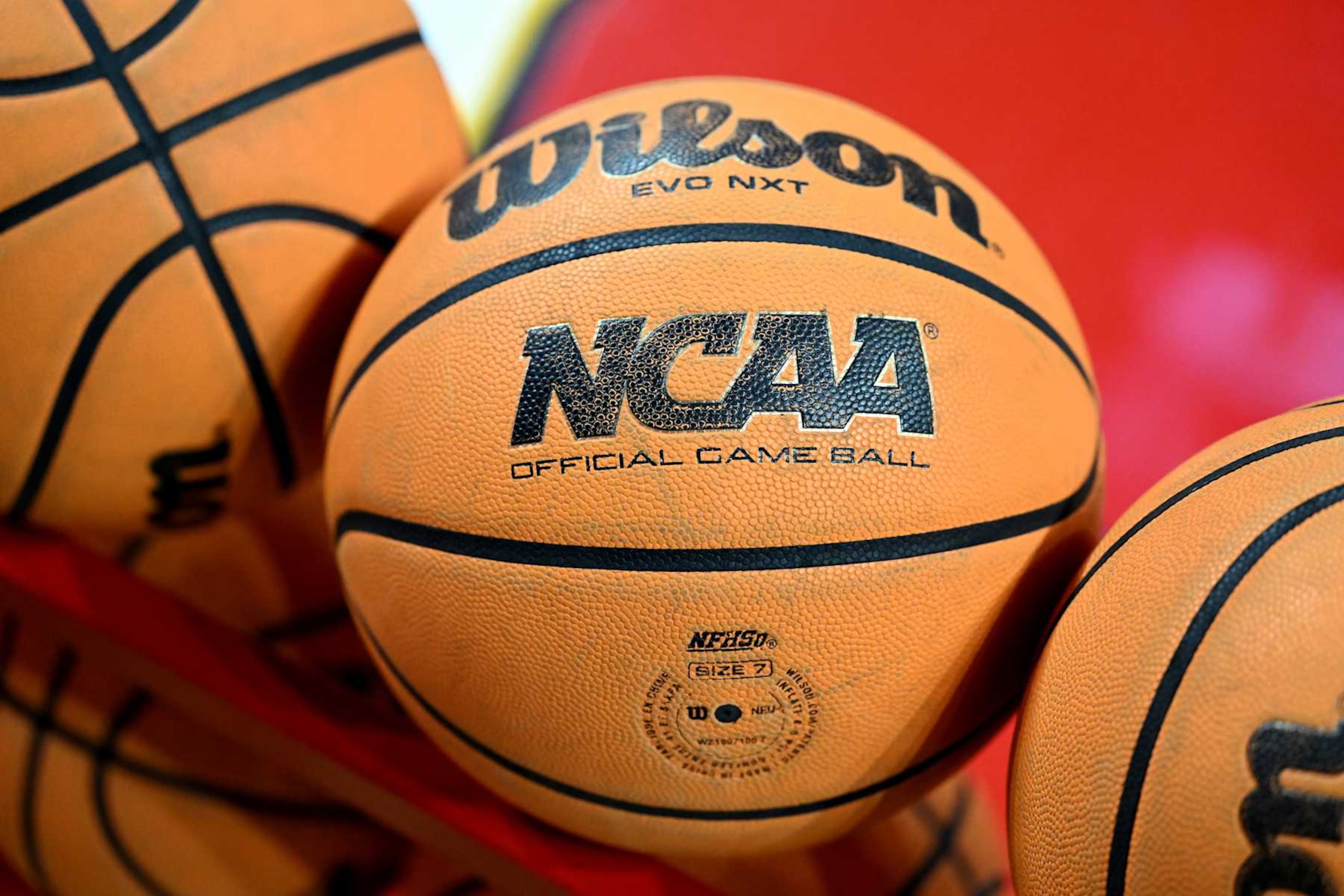 COLLEGE PARK, MARYLAND - DECEMBER 04: A view of the NCAA logo on a basketball before the game between the Maryland Terrapins and the Ohio State Buckeyes at Xfinity Center on December 04, 2024 in College Park, Maryland. (Photo by G Fiume/Getty Images)