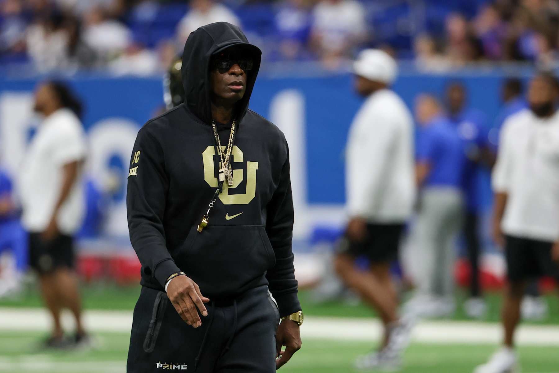 SAN ANTONIO, TX - DECEMBER 28: Colorado Buffaloes head coach Deion Sanders on the field for warmups before the football game between BYU Cougars and Colorado Buffalos on December 28, 2024, at the Alamodome in San Antonio, Texas. (Photo by David Buono/Icon Sportswire via Getty Images)