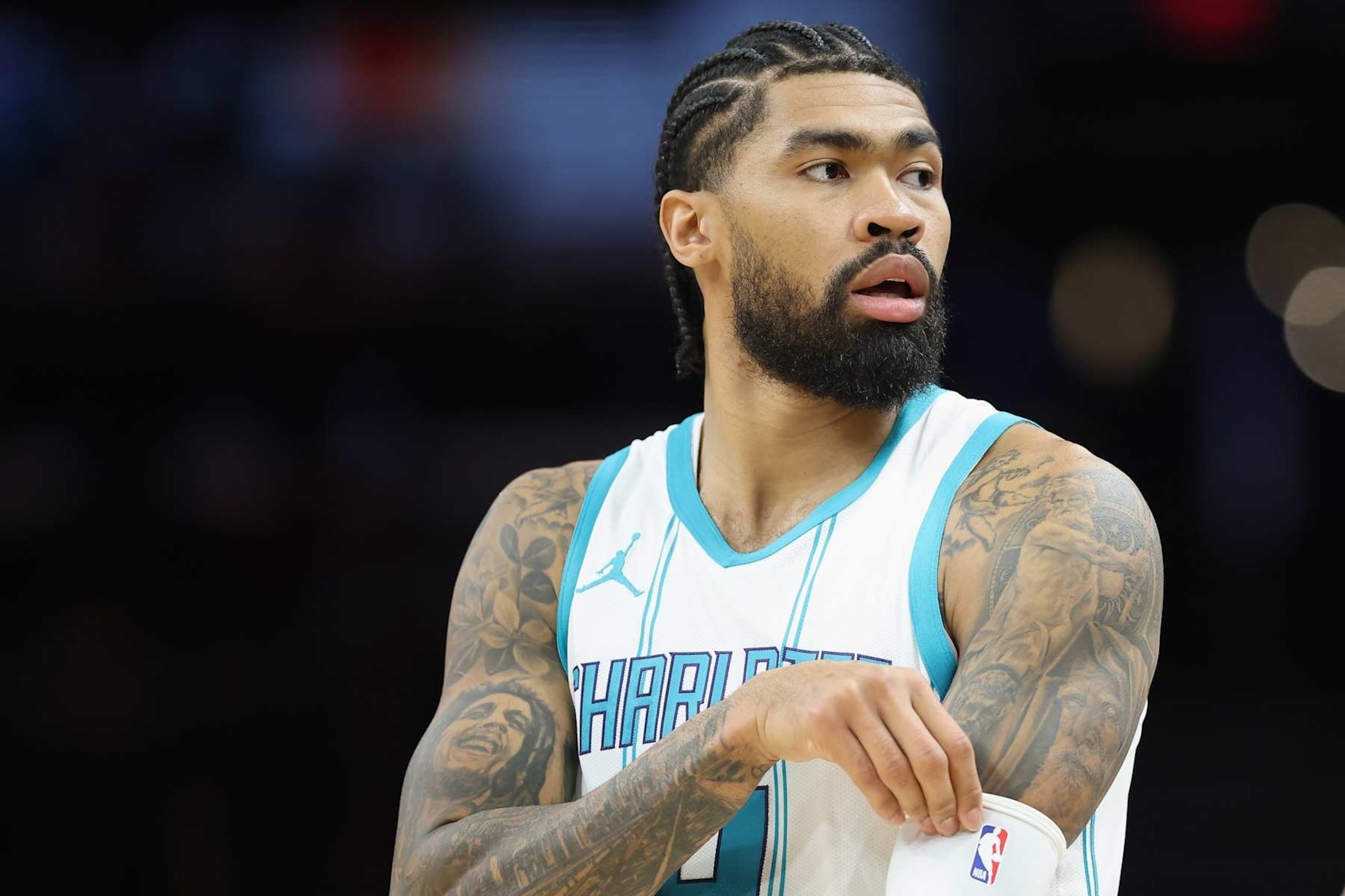 PHOENIX, ARIZONA - JANUARY 12: Nick Richards #4 of the Charlotte Hornets looks to the bench during the first half of the NBA game against the Phoenix Suns at Footprint Center on January 12, 2025 in Phoenix, Arizona. NOTE TO USER: User expressly acknowledges and agrees that, by downloading and or using this photograph, User is consenting to the terms and conditions of the Getty Images License Agreement. (Photo by Christian Petersen/Getty Images) PHOENIX, ARIZONA - JANUARY 12: Nick Richards #4 of the Charlotte Hornets looks to the bench during the first half of the NBA game against the Phoenix Suns at Footprint Center on January 12, 2025 in Phoenix, Arizona. NOTE TO USER: User expressly acknowledges and agrees that, by downloading and or using this photograph, User is consenting to the terms and conditions of the Getty Images License Agreement. (Photo by Christian Petersen/Getty Images)