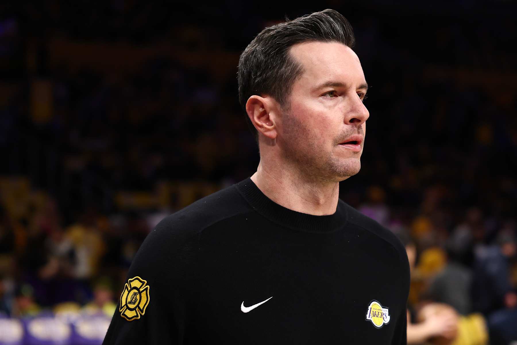 LOS ANGELES, CALIFORNIA - JANUARY 13: Head coach JJ Redick of the Los Angeles Lakers walks the court prior to the game against the San Antonio Spurs at Crypto.com Arena on January 13, 2025 in Los Angeles, California. NOTE TO USER: User expressly acknowledges and agrees that, by downloading and/or using this Photograph, user is consenting to the terms and conditions of the Getty Images License Agreement.  (Photo by Katelyn Mulcahy/Getty Images)