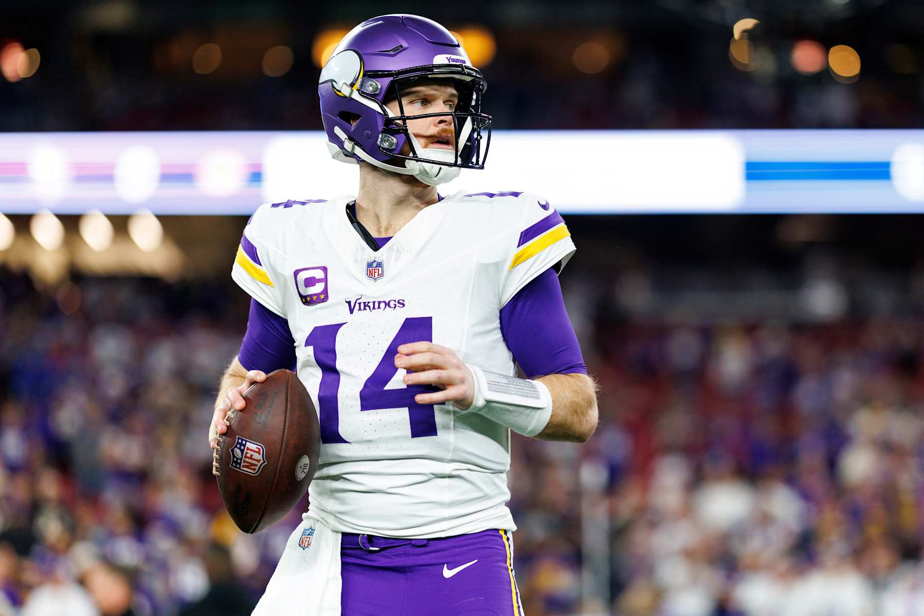 GLENDALE, ARIZONA - JANUARY 13: Quarterback Sam Darnold #14 of the Minnesota Vikings warms up prior to an NFC Wild Card game against the Los Angeles Rams, at State Farm Stadium on January 13, 2025 in Glendale, Arizona. (Photo by Brooke Sutton/Getty Images)