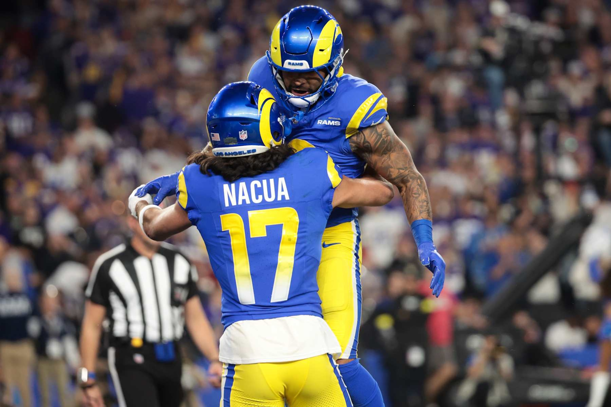 GLENDALE, AZ - JANUARY 13: Los Angeles Rams running back Kyren Williams celebrates his touchdown with Puka Nacua after a touchdown during the first quarter of the NFC Wildcard game against the Minnesota Vikings at State Farm Stadium on Monday, Jan. 13, 2025 in Glendale, AZ. (Wally Skalij / Los Angeles Times via Getty Images) GLENDALE, AZ - JANUARY 13: Los Angeles Rams running back Kyren Williams celebrates his touchdown with Puka Nacua after a touchdown during the first quarter of the NFC Wildcard game against the Minnesota Vikings at State Farm Stadium on Monday, Jan. 13, 2025 in Glendale, AZ. (Wally Skalij / Los Angeles Times via Getty Images)