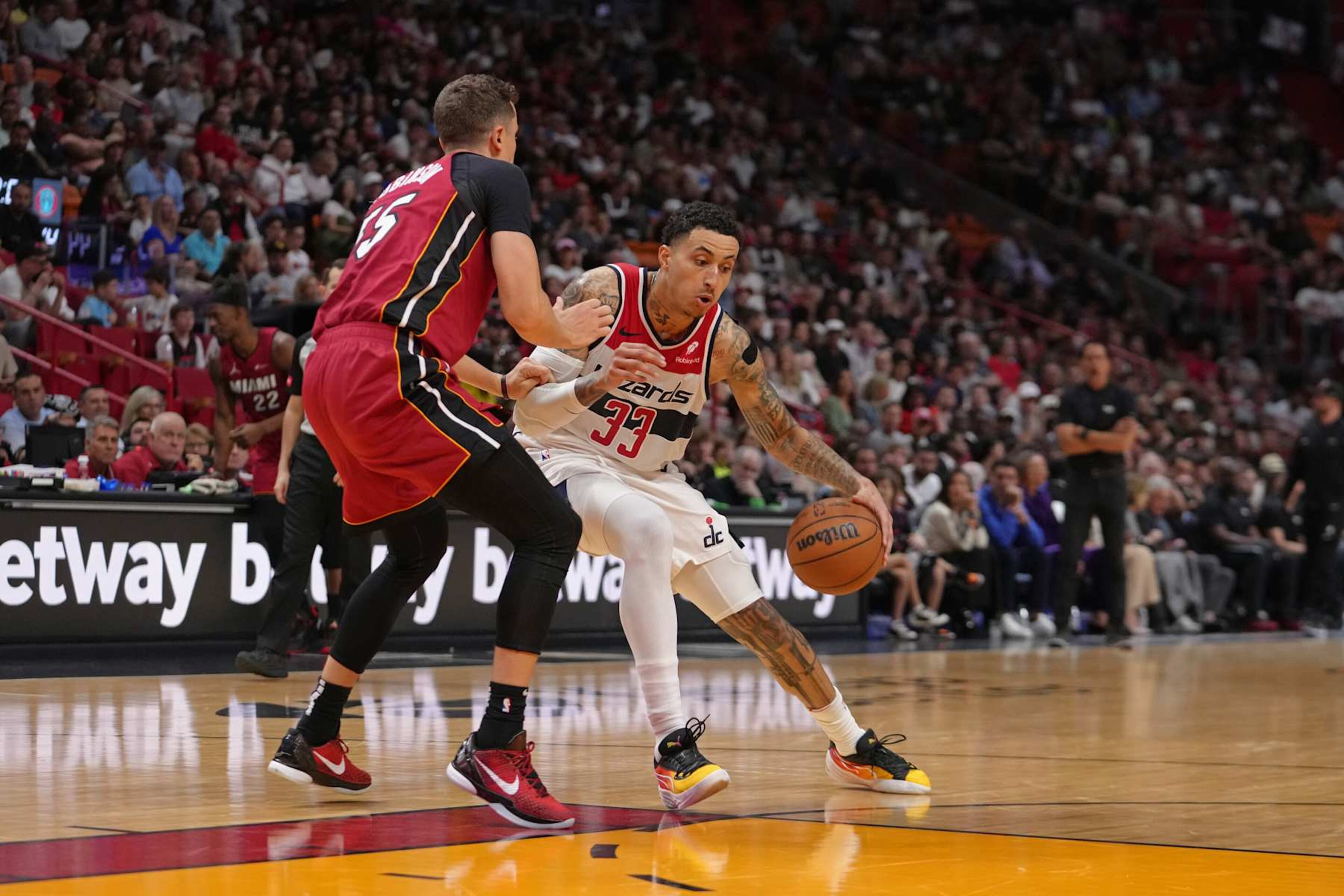 MIAMI, FL - MARCH 10: Kyle Kuzma #33 of the Washington Wizards handles the ball during the game against the Miami Heat on March 10, 2024 at Kaseya Center in Miami, Florida. NOTE TO USER: User expressly acknowledges and agrees that, by downloading and or using this Photograph, user is consenting to the terms and conditions of the Getty Images License Agreement. Mandatory Copyright Notice: Copyright 2024 NBAE (Photo by Eric Espada/NBAE via Getty Images) MIAMI, FL - MARCH 10: Kyle Kuzma #33 of the Washington Wizards handles the ball during the game against the Miami Heat on March 10, 2024 at Kaseya Center in Miami, Florida. NOTE TO USER: User expressly acknowledges and agrees that, by downloading and or using this Photograph, user is consenting to the terms and conditions of the Getty Images License Agreement. Mandatory Copyright Notice: Copyright 2024 NBAE (Photo by Eric Espada/NBAE via Getty Images)
