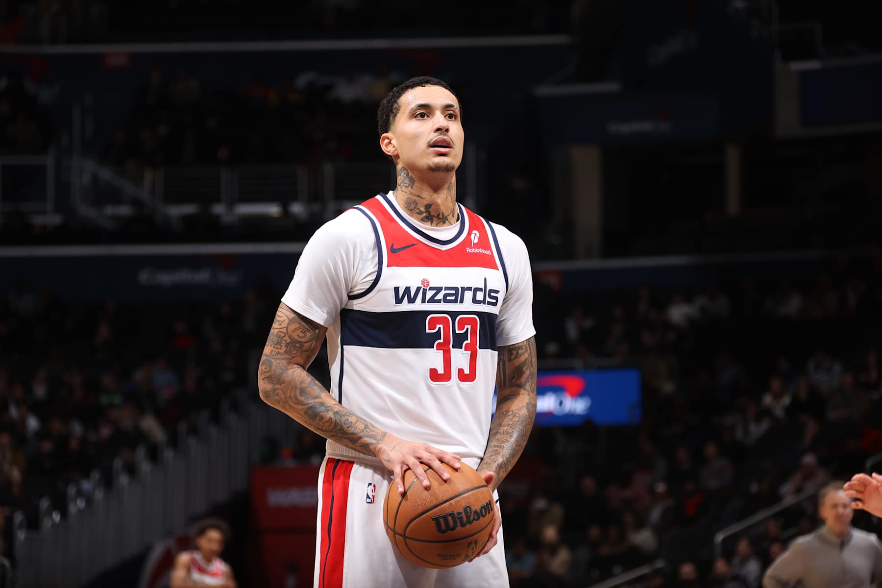 WASHINGTON, DC - JANUARY 13:  Kyle Kuzma #33 of the Washington Wizards shoots a free throw during the game against the Minnesota Timberwolves on January 13, 2025 at Capital One Arena in Washington, DC. NOTE TO USER: User expressly acknowledges and agrees that, by downloading and or using this Photograph, user is consenting to the terms and conditions of the Getty Images License Agreement. Mandatory Copyright Notice: Copyright 2024 NBAE (Photo by Kenny Giarla/NBAE via Getty Images)