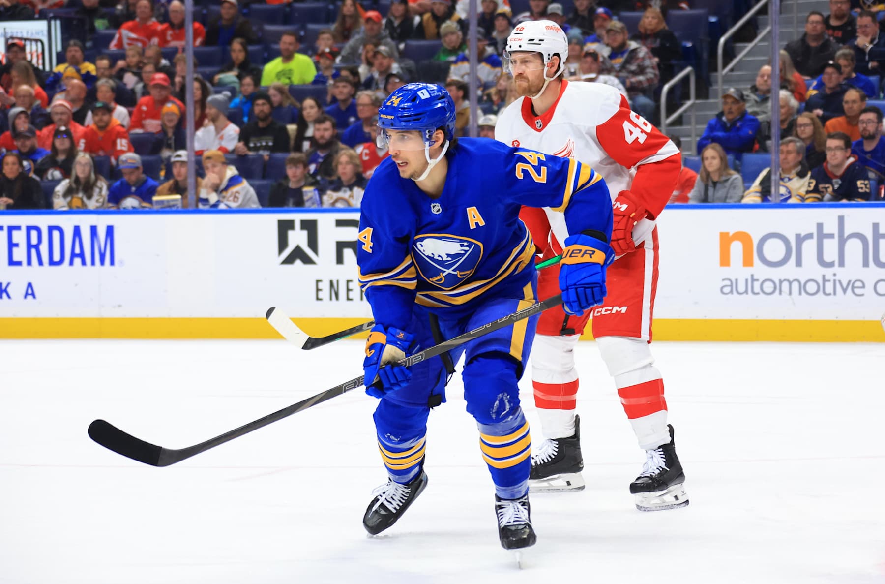 BUFFALO, NEW YORK - DECEMBER 9: Jeff Petry #46 of the Detroit Red Wings defends against Dylan Cozens #24 of the Buffalo Sabres during an NHL game on December 9, 2024 at KeyBank Center in Buffalo, New York. (Photo by Bill Wippert/NHLI via Getty Images)