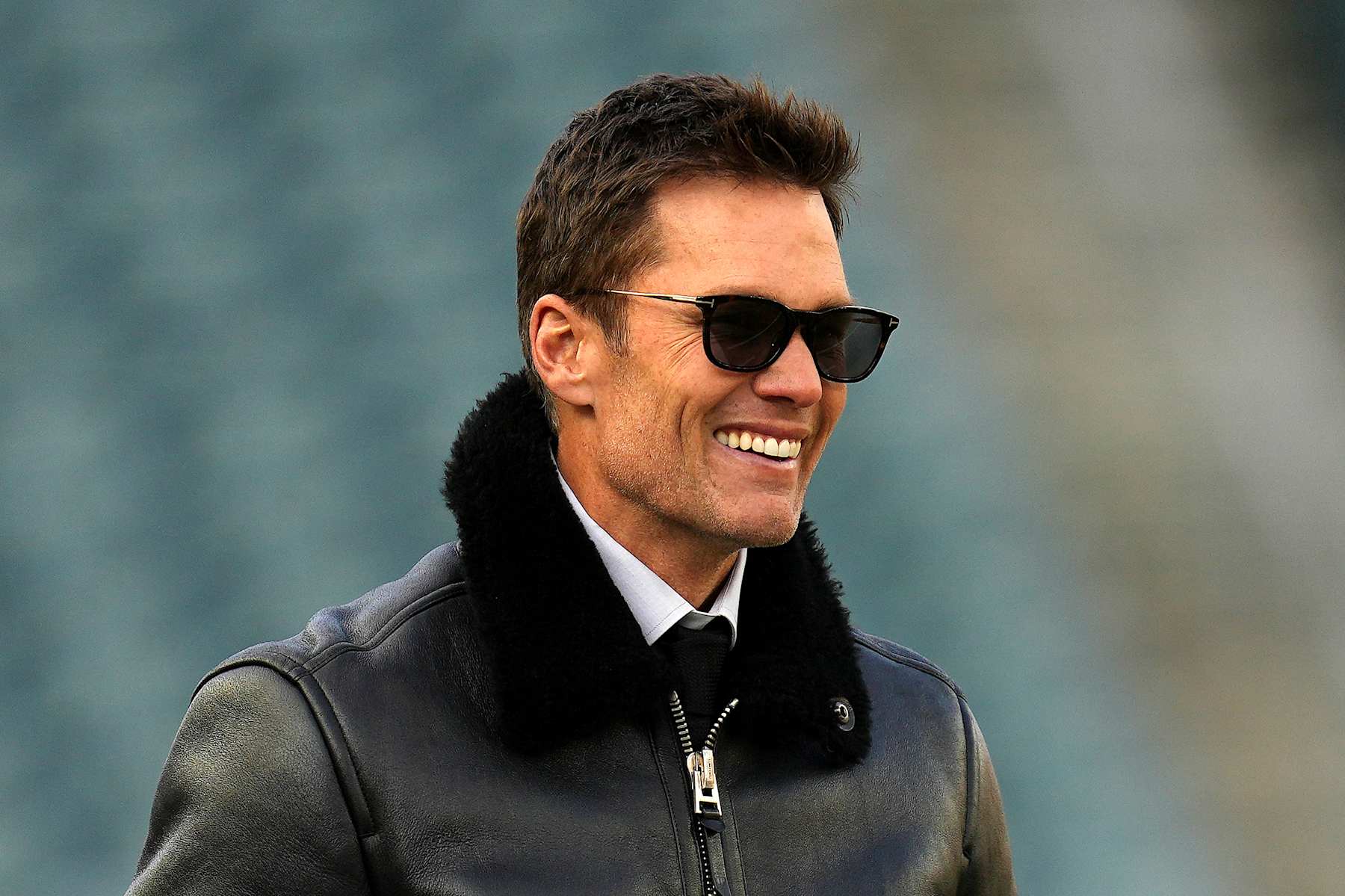 PHILADELPHIA, PENNSYLVANIA - JANUARY 12: Former NFL Player Tom Brady looks on prior to the NFC Wild Card Playoff between the Green Bay Packers and the Philadelphia Eagles at Lincoln Financial Field on January 12, 2025 in Philadelphia, Pennsylvania.  (Photo by Mitchell Leff/Getty Images)