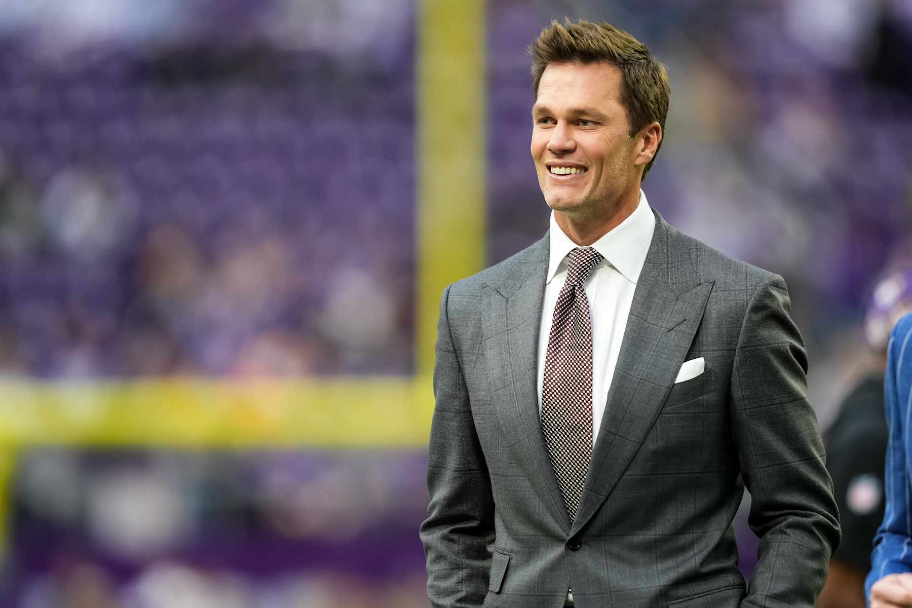 MINNEAPOLIS, MINNESOTA - DECEMBER 29: Former NFL player Tom Brady looks on prior to a game between the Minnesota Vikings and Green Bay Packers at U.S. Bank Stadium on December 29, 2024 in Minneapolis, Minnesota. (Photo by Brace Hemmelgarn/Getty Images) MINNEAPOLIS, MINNESOTA - DECEMBER 29: Former NFL player Tom Brady looks on prior to a game between the Minnesota Vikings and Green Bay Packers at U.S. Bank Stadium on December 29, 2024 in Minneapolis, Minnesota. (Photo by Brace Hemmelgarn/Getty Images)
