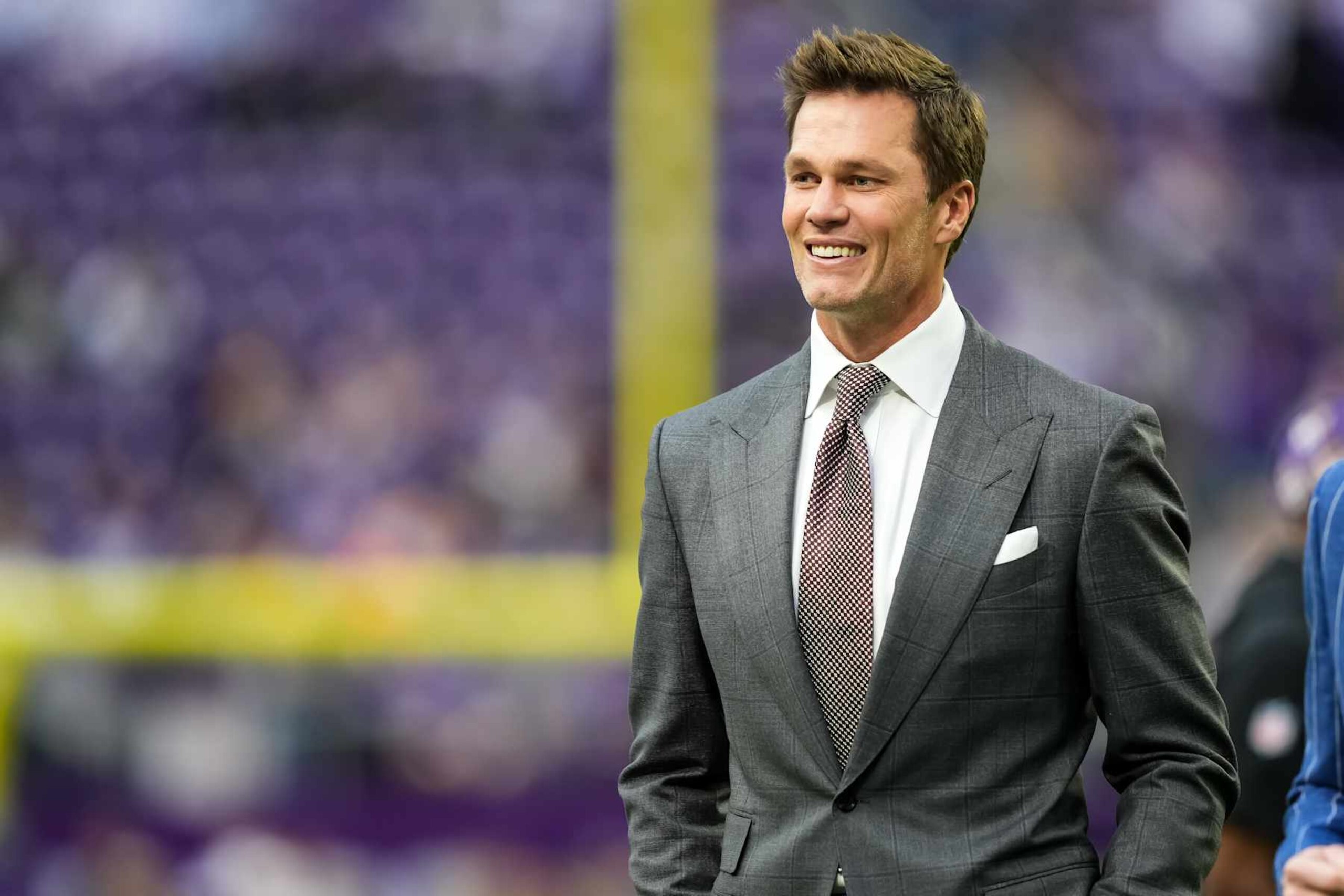 MINNEAPOLIS, MINNESOTA - DECEMBER 29: Former NFL player Tom Brady looks on prior to a game between the Minnesota Vikings and Green Bay Packers at U.S. Bank Stadium on December 29, 2024 in Minneapolis, Minnesota. (Photo by Brace Hemmelgarn/Getty Images) MINNEAPOLIS, MINNESOTA - DECEMBER 29: Former NFL player Tom Brady looks on prior to a game between the Minnesota Vikings and Green Bay Packers at U.S. Bank Stadium on December 29, 2024 in Minneapolis, Minnesota. (Photo by Brace Hemmelgarn/Getty Images)