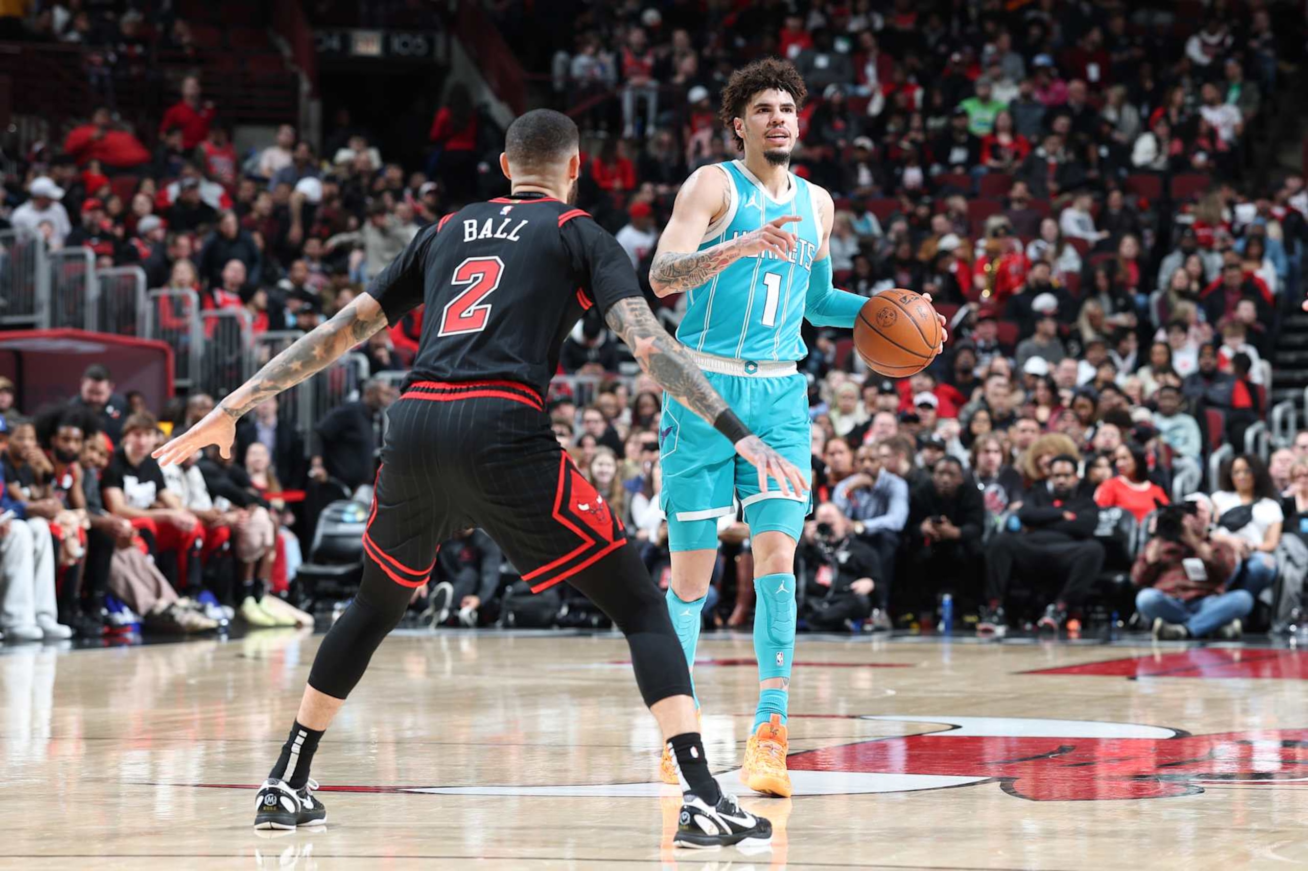 CHICAGO, IL - JANUARY 17: LaMelo Ball #1 of the Charlotte Hornets dribbles the ball during the game against his brother Lonzo Ball #2 of the Chicago Bulls on January 17, 2025 at United Center in Chicago, Illinois. NOTE TO USER: User expressly acknowledges and agrees that, by downloading and or using this photograph, User is consenting to the terms and conditions of the Getty Images License Agreement. Mandatory Copyright Notice: Copyright 2025 NBAE (Photo by Jeff Haynes/NBAE via Getty Images) CHICAGO, IL - JANUARY 17: LaMelo Ball #1 of the Charlotte Hornets dribbles the ball during the game against his brother Lonzo Ball #2 of the Chicago Bulls on January 17, 2025 at United Center in Chicago, Illinois. NOTE TO USER: User expressly acknowledges and agrees that, by downloading and or using this photograph, User is consenting to the terms and conditions of the Getty Images License Agreement. Mandatory Copyright Notice: Copyright 2025 NBAE (Photo by Jeff Haynes/NBAE via Getty Images)