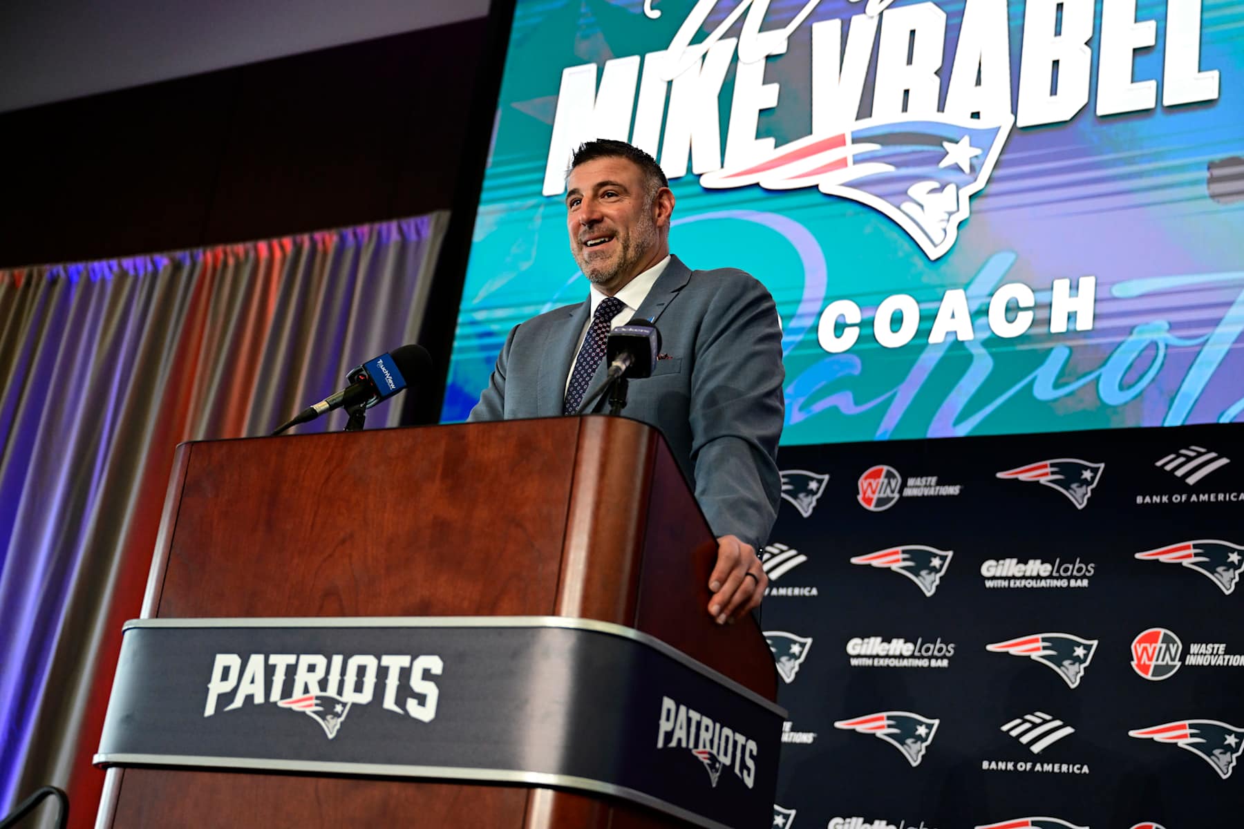 FOXBOROUGH, MASSACHUSETTS - JANUARY 13: Mike Vrabel speaks as he is introduced as head coach of the New England Patriots during a press conference at Gillette Stadium on January 13, 2025 in Foxborough, Massachusetts.  (Photo by Billie Weiss/Getty Images)