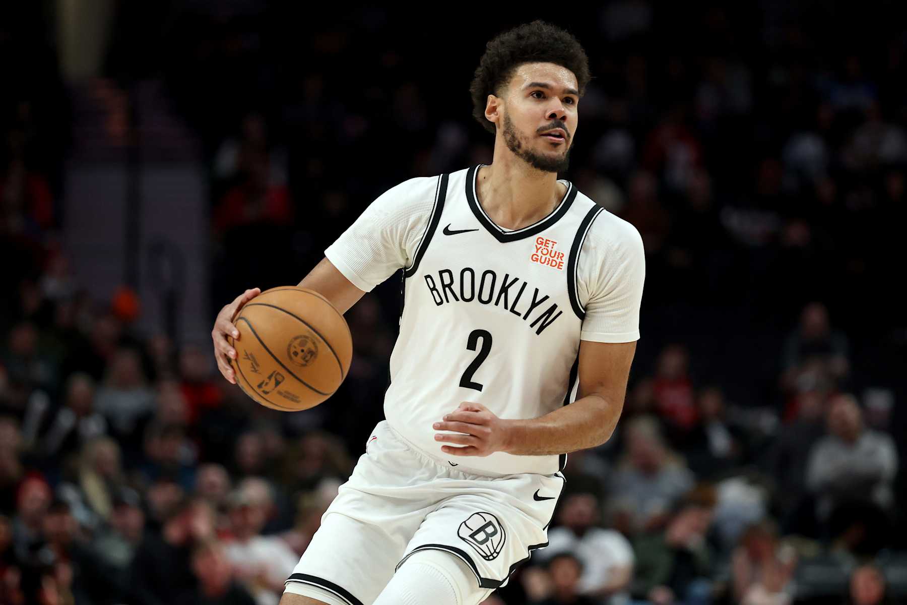 PORTLAND, OREGON - JANUARY 14: Cameron Johnson #2 of the Brooklyn Nets dribbles against the Portland Trail Blazers during the second half at Moda Center on January 14, 2025 in Portland, Oregon. NOTE TO USER: User expressly acknowledges and agrees that, by downloading and or using this photograph, User is consenting to the terms and conditions of the Getty Images License Agreement. (Photo by Steph Chambers/Getty Images)