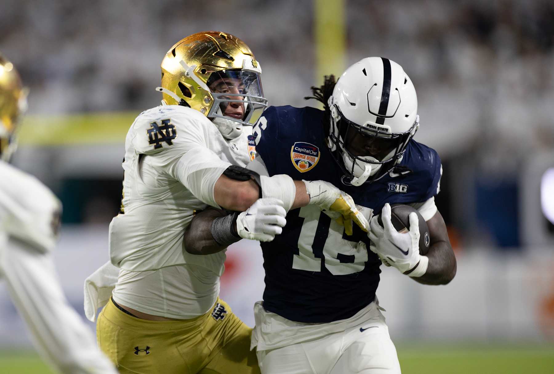 MIAMI GARDENS, FLORIDA - JANUARY 9: Drayk Bowen #34 of Notre Dame Fighting Irish tackles Khalil Dinkins #16 of Penn State Nittany Lions during the game at Hard Rock Stadium on January 9, 2025 in Miami Gardens, Florida. (Photo by Michael Pimentel/ISI Photos/Getty Images)