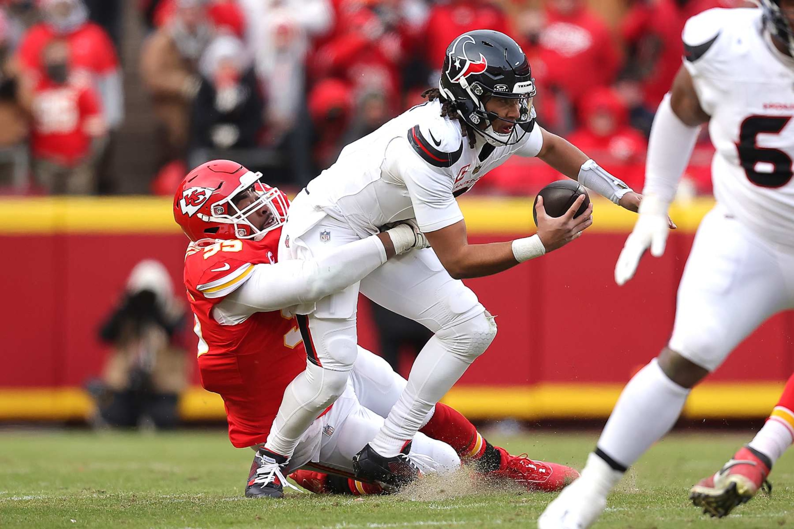KANSAS CITY, MISSOURI - JANUARY 18: Chris Jones #95 of the Kansas City Chiefs sacks C.J. Stroud #7 of the Houston Texans during the first quarter in the AFC Divisional Playoff at GEHA Field at Arrowhead Stadium on January 18, 2025 in Kansas City, Missouri. (Photo by David Eulitt/Getty Images) KANSAS CITY, MISSOURI - JANUARY 18: Chris Jones #95 of the Kansas City Chiefs sacks C.J. Stroud #7 of the Houston Texans during the first quarter in the AFC Divisional Playoff at GEHA Field at Arrowhead Stadium on January 18, 2025 in Kansas City, Missouri. (Photo by David Eulitt/Getty Images)