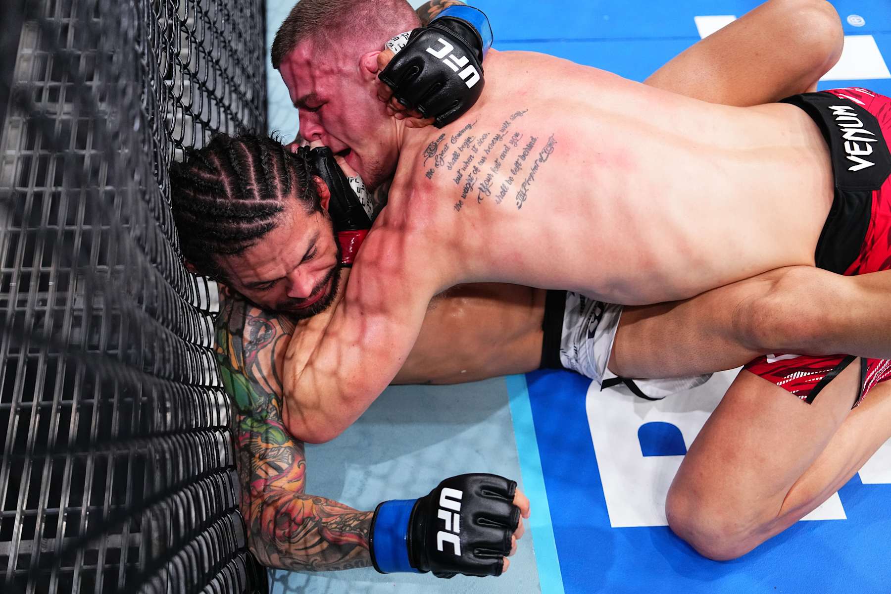 INGLEWOOD, CALIFORNIA - JANUARY 18: (R-L) Grant Dawson battles Diego Ferreira of Brazil in a lightweight fight during the UFC 311 event at Intuit Dome on January 18, 2025 in Inglewood, California. (Photo by Jeff Bottari/Zuffa LLC)