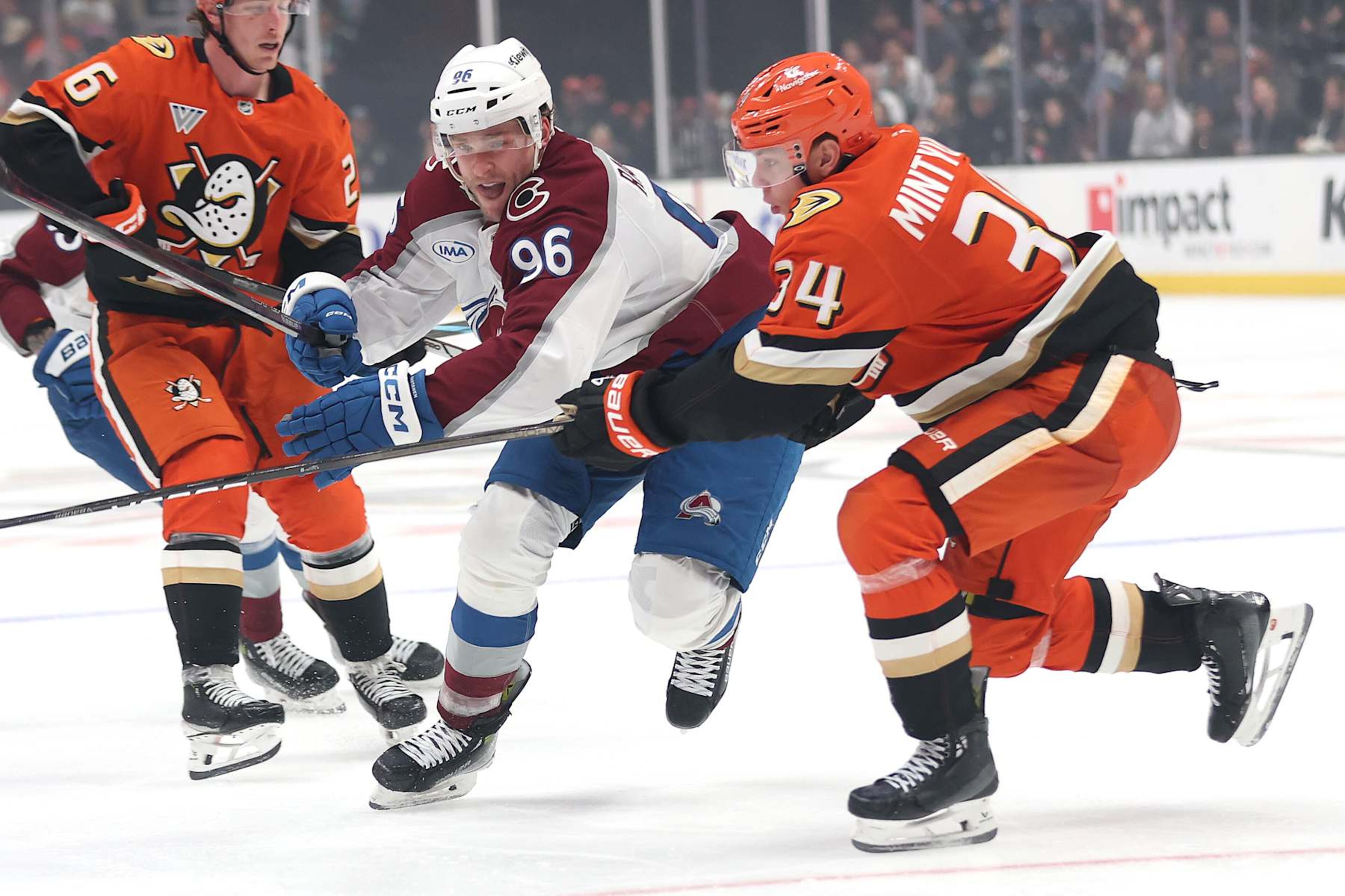 ANAHEIM, CALIFORNIA - DECEMBER 20: Pavel Mintyukov #34 of the Anaheim Ducks defends against Mikko Rantanen #96 of the Colorado Avalanche during the third period of a game at Honda Center on December 20, 2024 in Anaheim, California. (Photo by Sean M. Haffey/Getty Images) ANAHEIM, CALIFORNIA - DECEMBER 20: Pavel Mintyukov #34 of the Anaheim Ducks defends against Mikko Rantanen #96 of the Colorado Avalanche during the third period of a game at Honda Center on December 20, 2024 in Anaheim, California. (Photo by Sean M. Haffey/Getty Images)